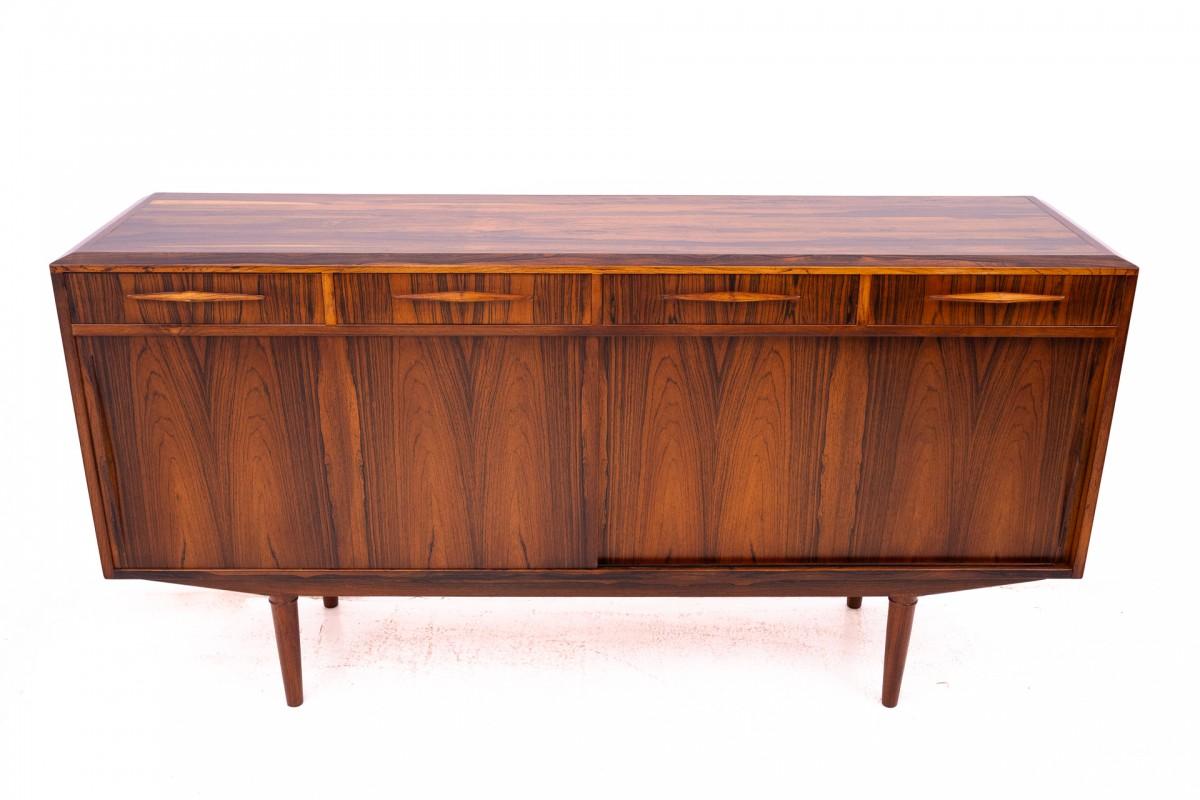 Sideboard chest of drawers, Danish design, 1960s.

The chest of drawers has four external drawers. Behind the sliding doors there are two spacious spaces, each with one shelf.

The minimalist, timeless design will work great in modern, contemporary