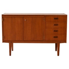 Sideboard with pull-out top