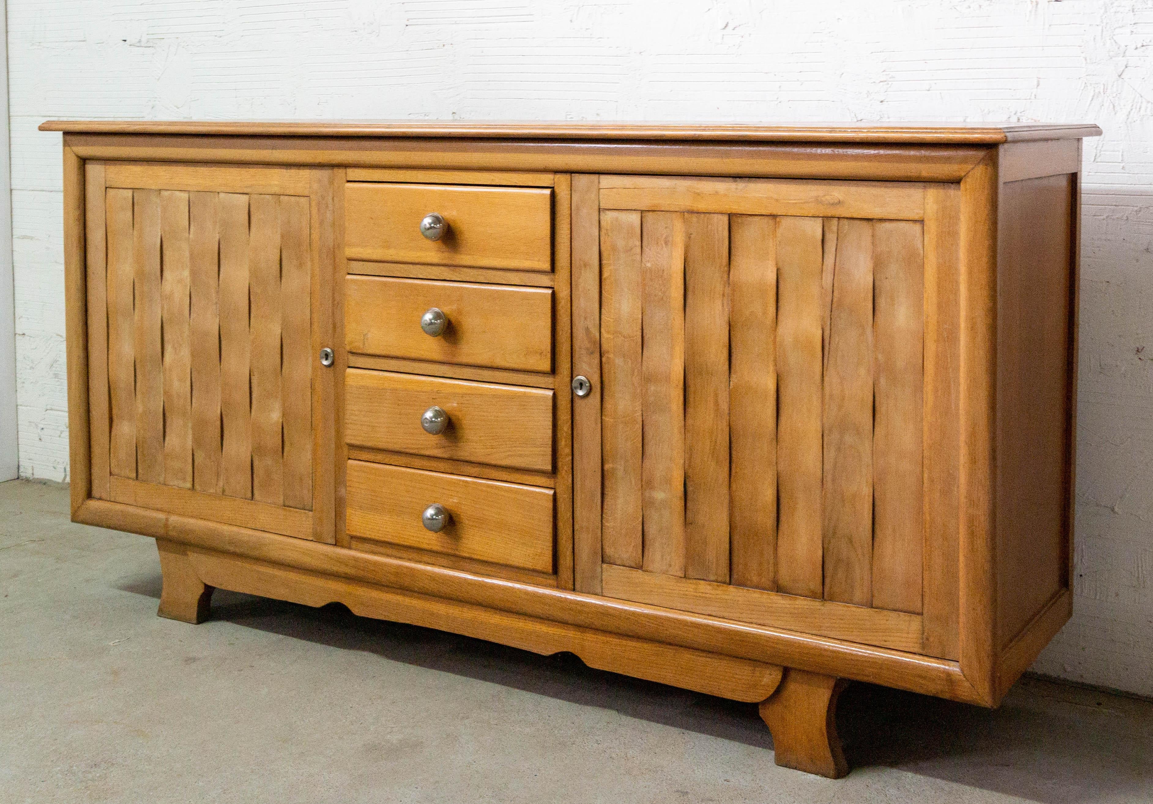 Midcentury sideboard credenza buffet
Carved with a waven effect
Stylish 
In good condition with signs minor signs of age

Shipping:
L 210/P 52/ H 103 cm 81 kg.