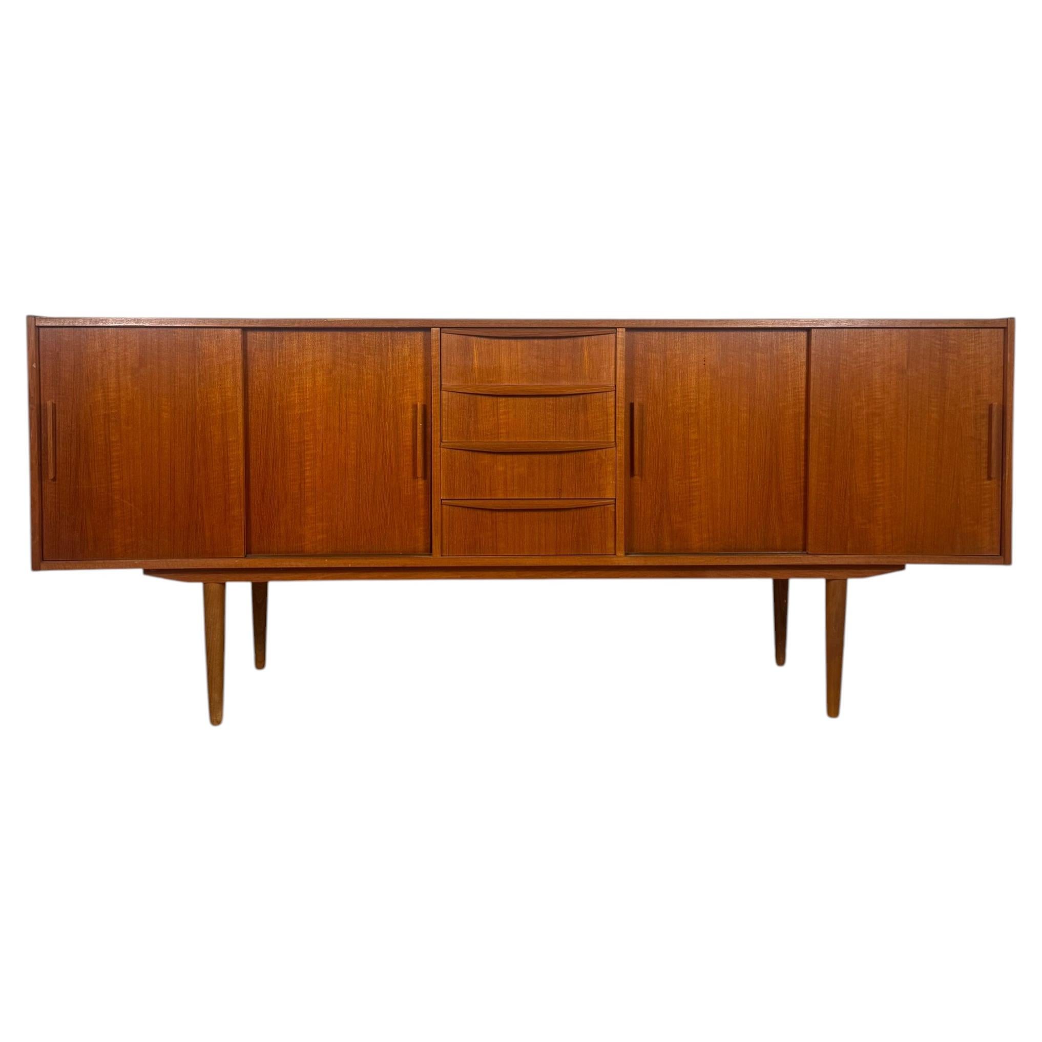 Danish four-drawer teak sideboard, 1960s For Sale