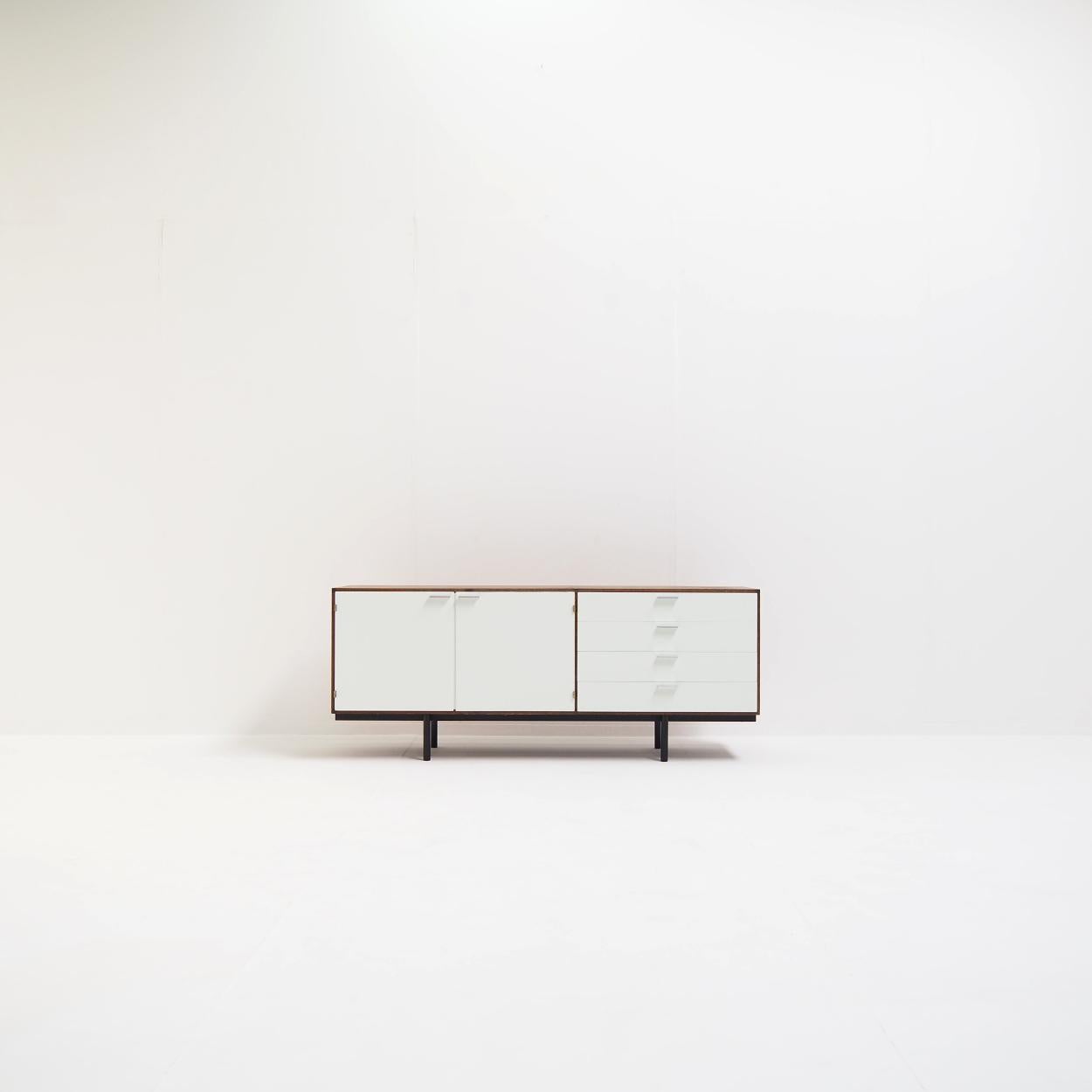 Sideboard in wengé wood designed by Cees Braakman for Pastoe.

With its smaller size it is a versatile and ideal item for urban spaces. Large enough to provide practical storage, yet compact enough to fit effortlessly into smaller spaces. Or to
