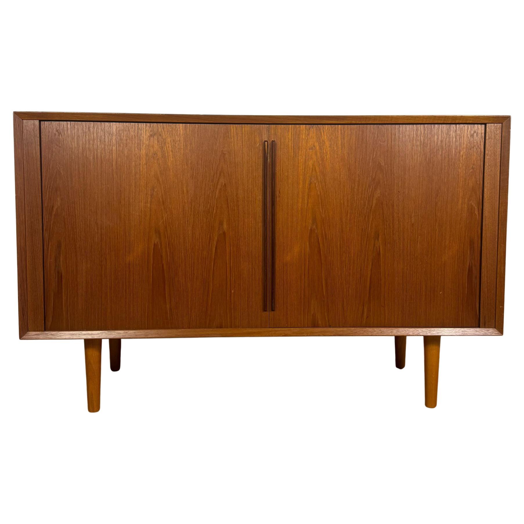 Sideboard by Kai Kristiansen in teak with retractable doors, Denmark, 1960s For Sale