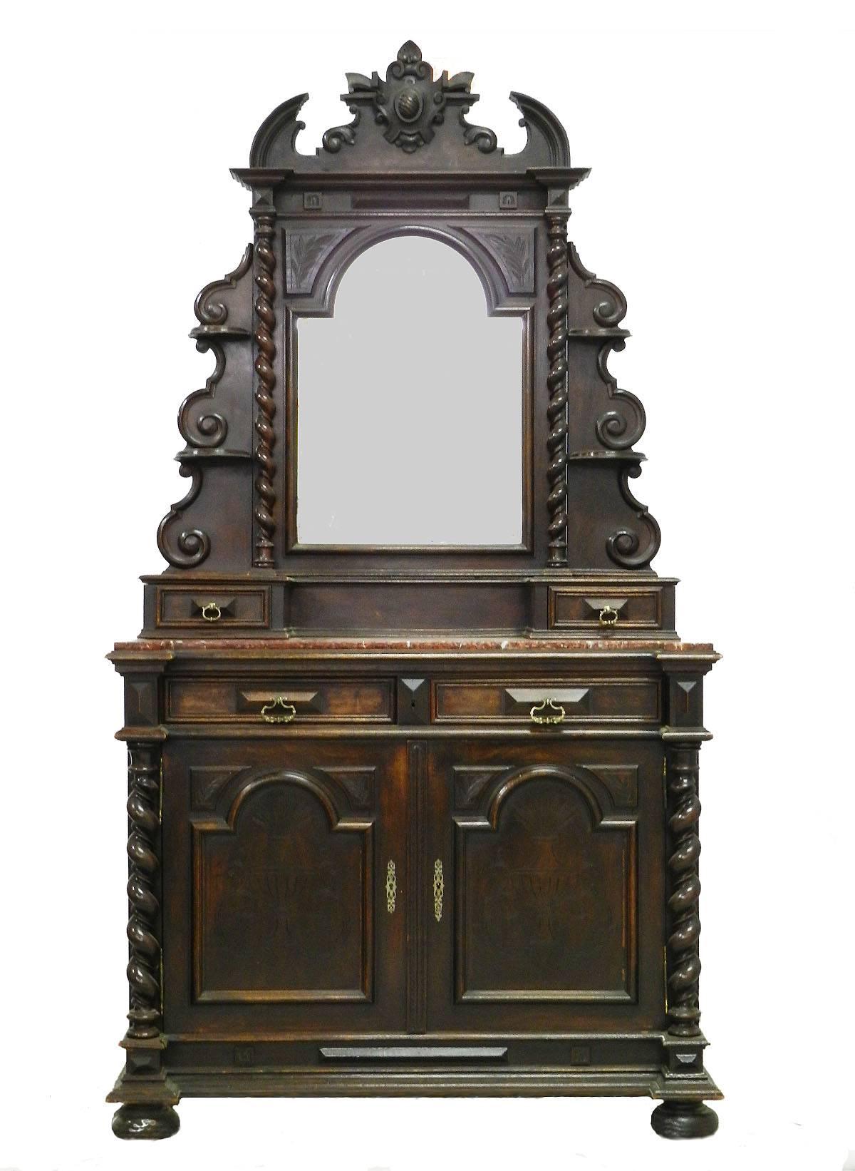 Sideboard buffet 19th century Louis XIII revival, circa 1850.
Credenza dresser cupboard
original bevelled mirror
variegated rouge marble top
carved dark walnut
with key.





 