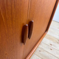 Dyrlund teak sideboard with retractable doors, Denmark, 1960s