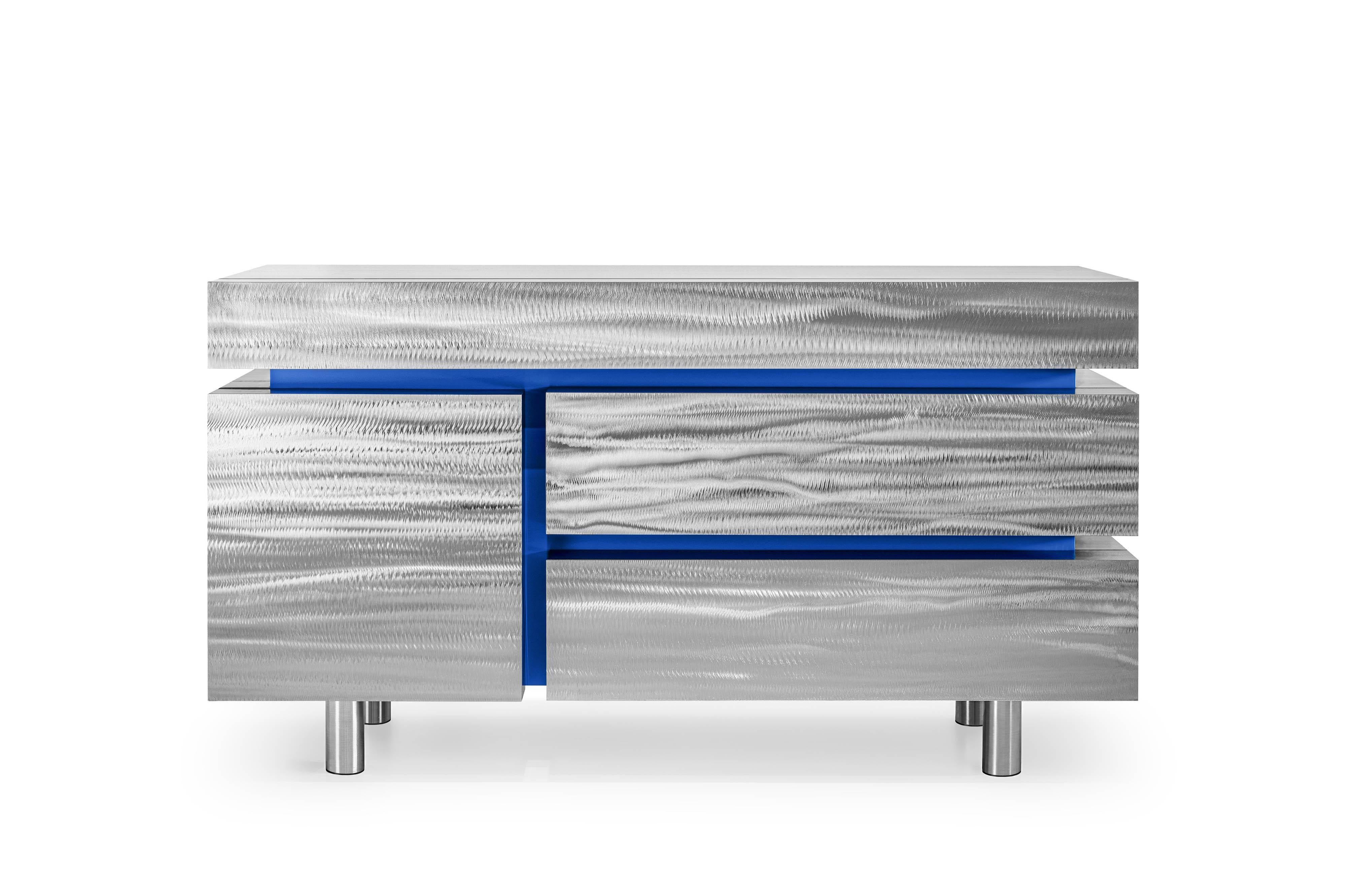 Sideboard Gerrit CSL by Noom
Materials: Hand brushed stainless steel, MDF
Dimensions: H 80 x W 140 x D 50 cm.

The metal sideboard has four drawers and is contemporary, massive, and elegant at the same time. This is a kind of understanding of