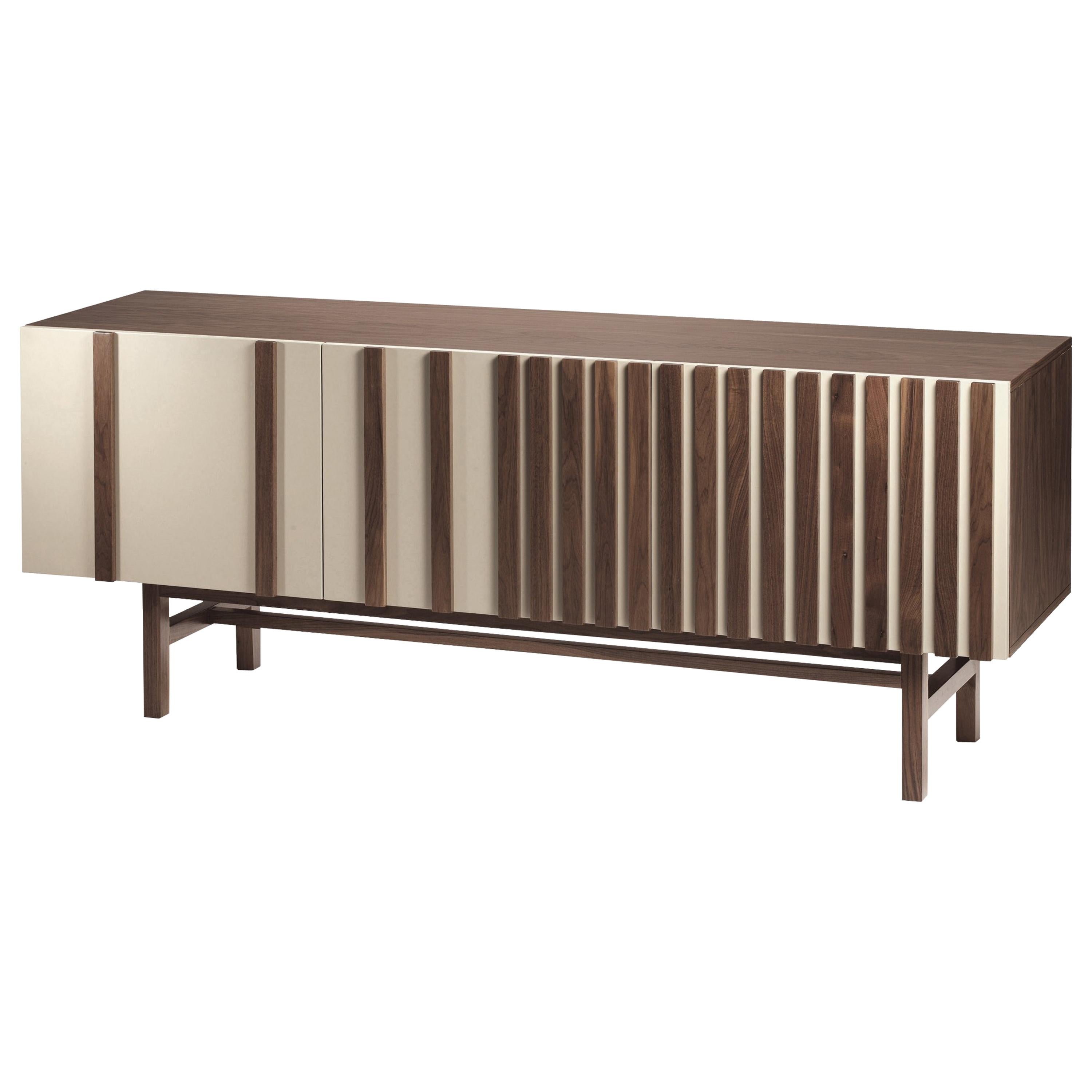Go sideboard is a high quality product by Mambo Unlimited Ideas, crafted in wood veneer structure, lacquered mdf doors and plywood veneer applications on doors. It features three dimensional designs on its doors, elegant vertical stripes of plywood