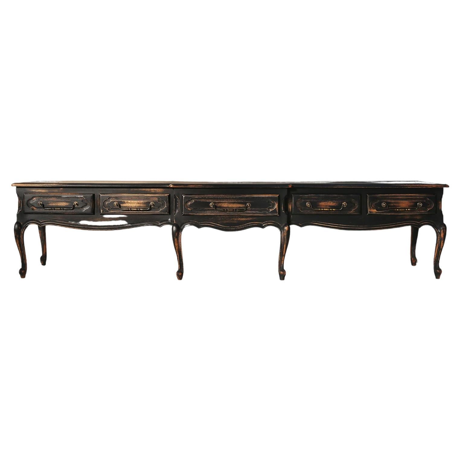 This Louis XIV-style sideboard is a unique and stylish piece of furniture that takes any interior to the next level. It is inspired by the French king who was known for his luxurious and artistic taste. It has a classic and timeless look that