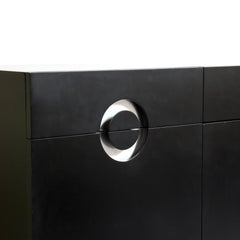 Sideboard in matte black lacquered wood with brushed steel details.