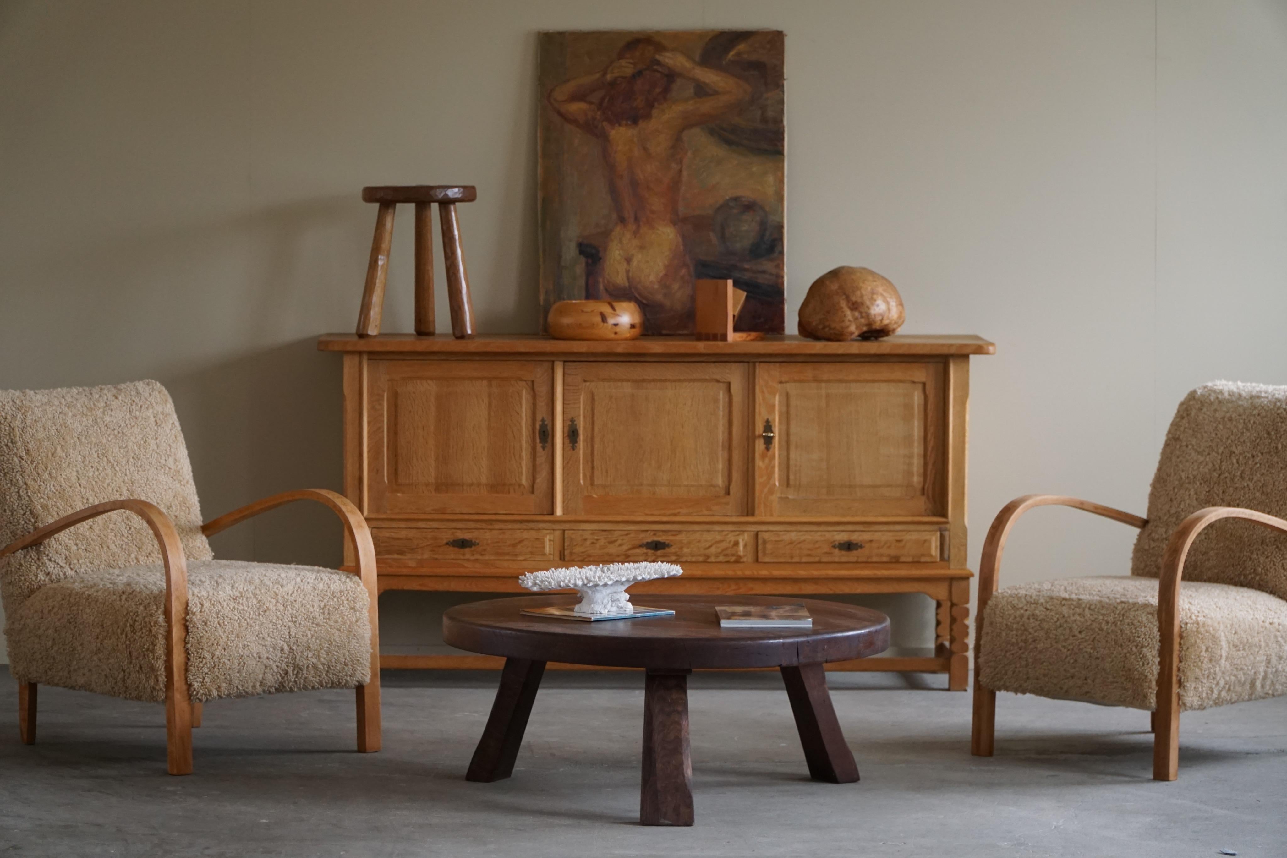 Appealing Classic Mid-Century Modern cabinet / sideboard made by a Danish cabinetmaker in the 1960s. The sideboard is made from high-quality oak, chosen for its durability and natural beauty. The wood is lightly oiled to bring out its grain and