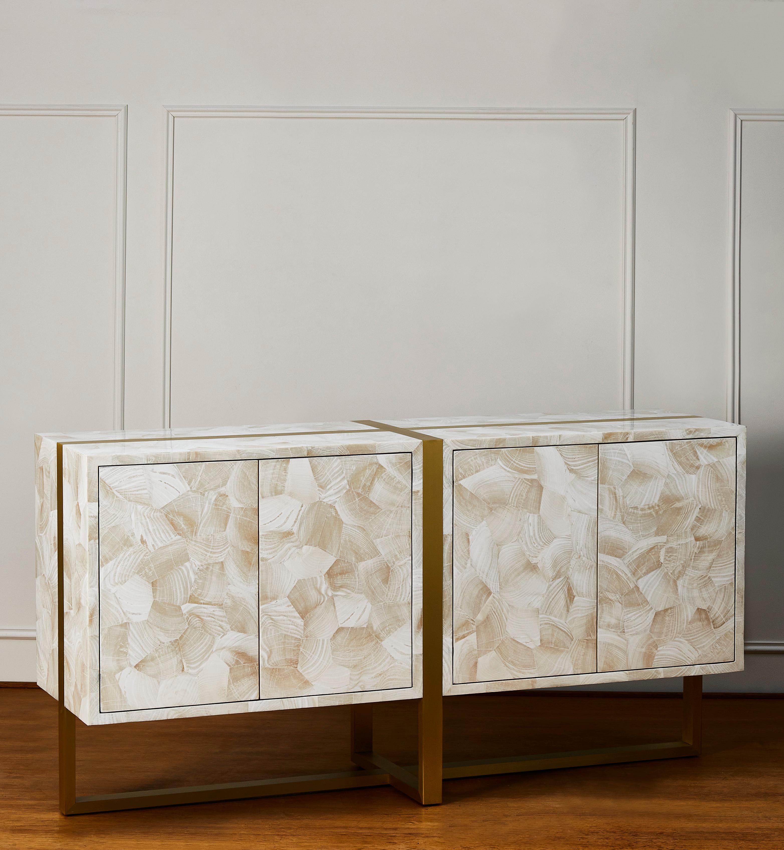 Exceptional sideboard in Marquetry of oceanic fossils and polished brass structure and feet.
4 doors.
Creation by Studio Glustin. France, 2020.