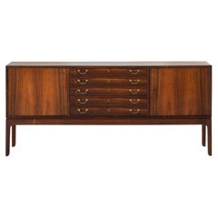 Sideboard in Rosewood and brass by Ole Wanscher