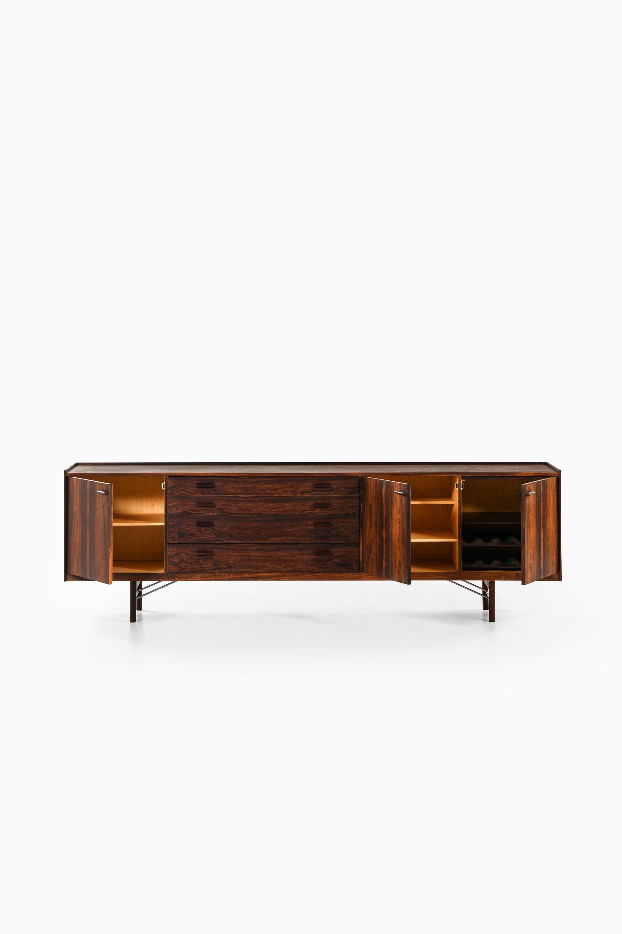 Danish Sideboard in Rosewood and Steel by Ib Kofod-Larsen, 1960s For Sale