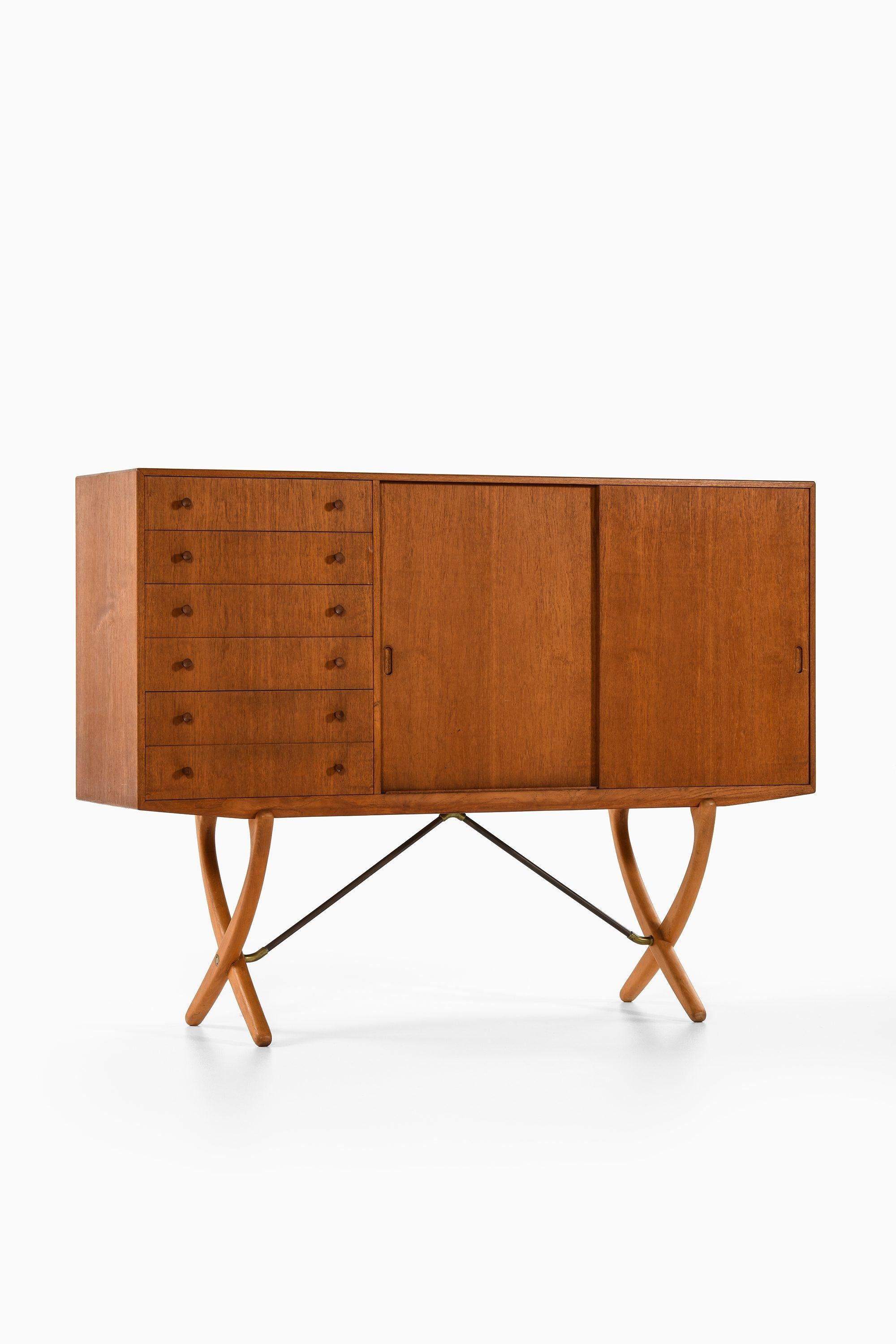 Sideboard in Teak, Beech and Brass by Hans Wegner, 1950's

Additional Information:
Material: Teak, beech and brass
Style: Mid century, Scandinavia
Rare sideboard model CH-304
Produced by Carl Hansen & Son in Denmark
Dimensions (W x D x H): 168 x 45