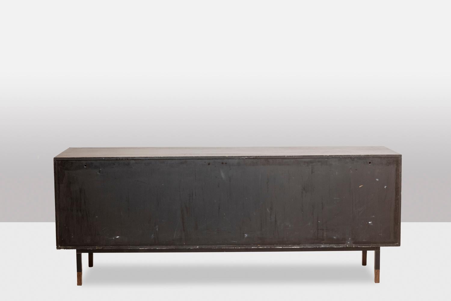 European Sideboard in wenge, raffia and lacquered metal. 1970s. For Sale