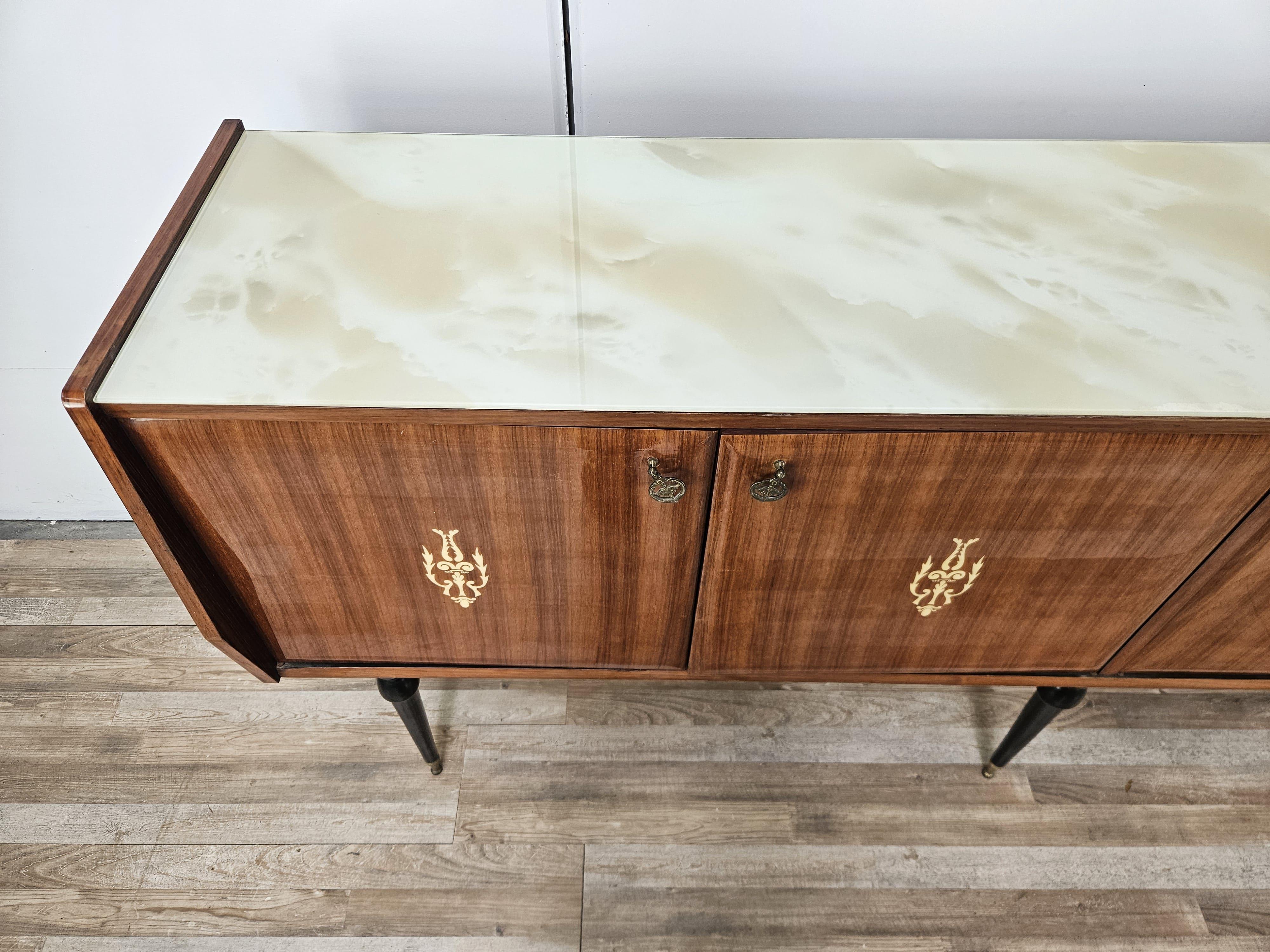 Veneer Italian mahogany sideboard from the mid-1960s with glass top For Sale