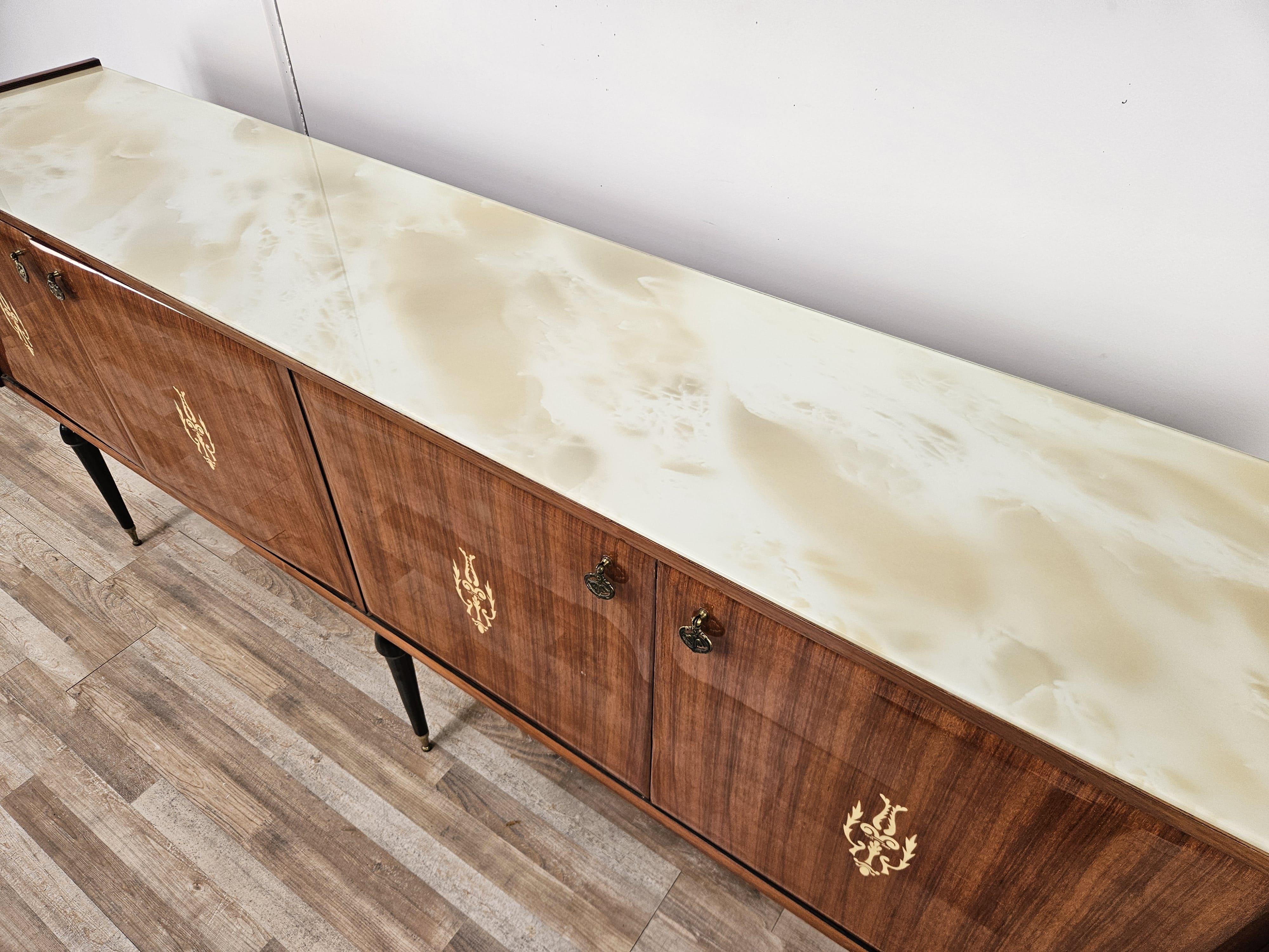 Brass Italian mahogany sideboard from the mid-1960s with glass top For Sale