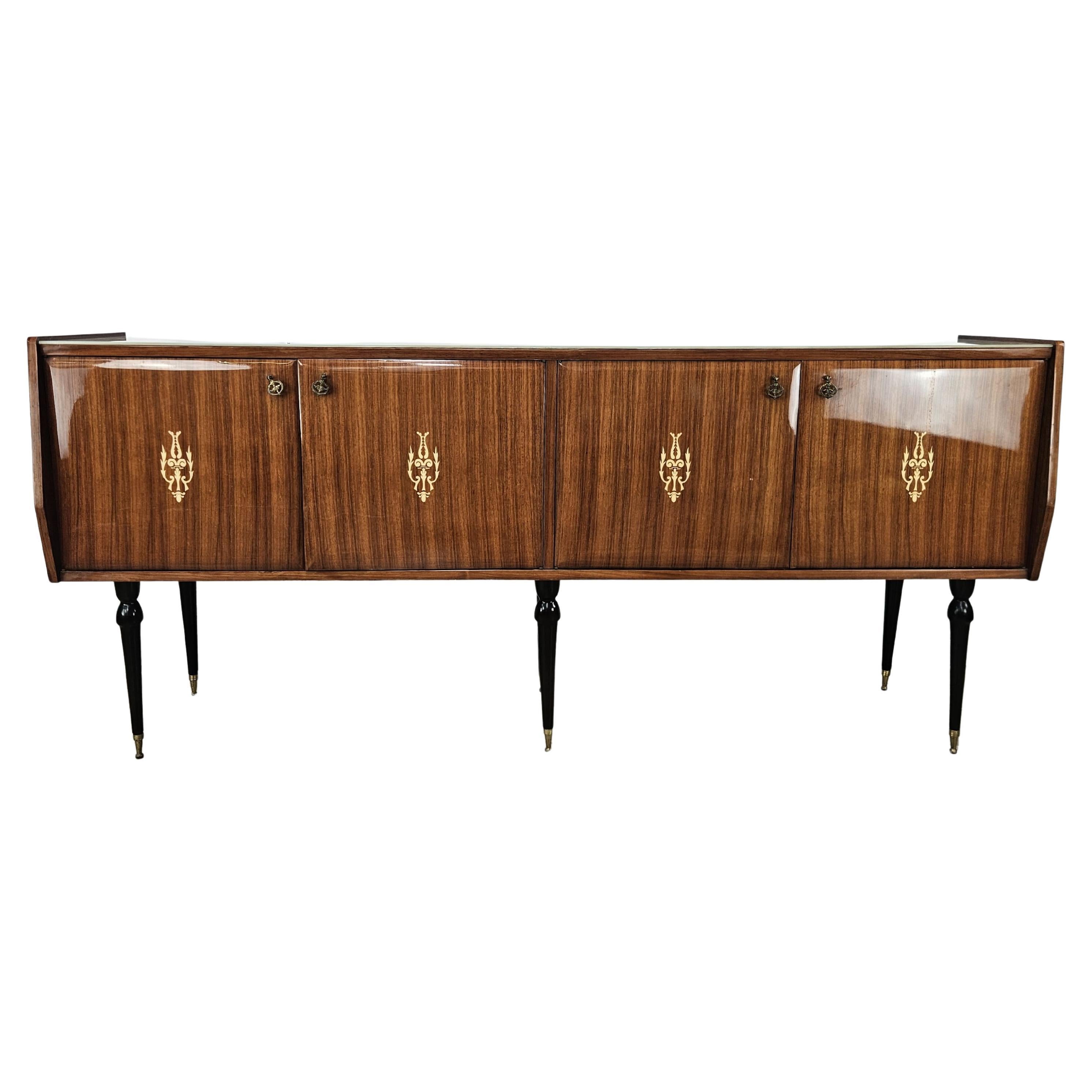 Italian mahogany sideboard from the mid-1960s with glass top For Sale