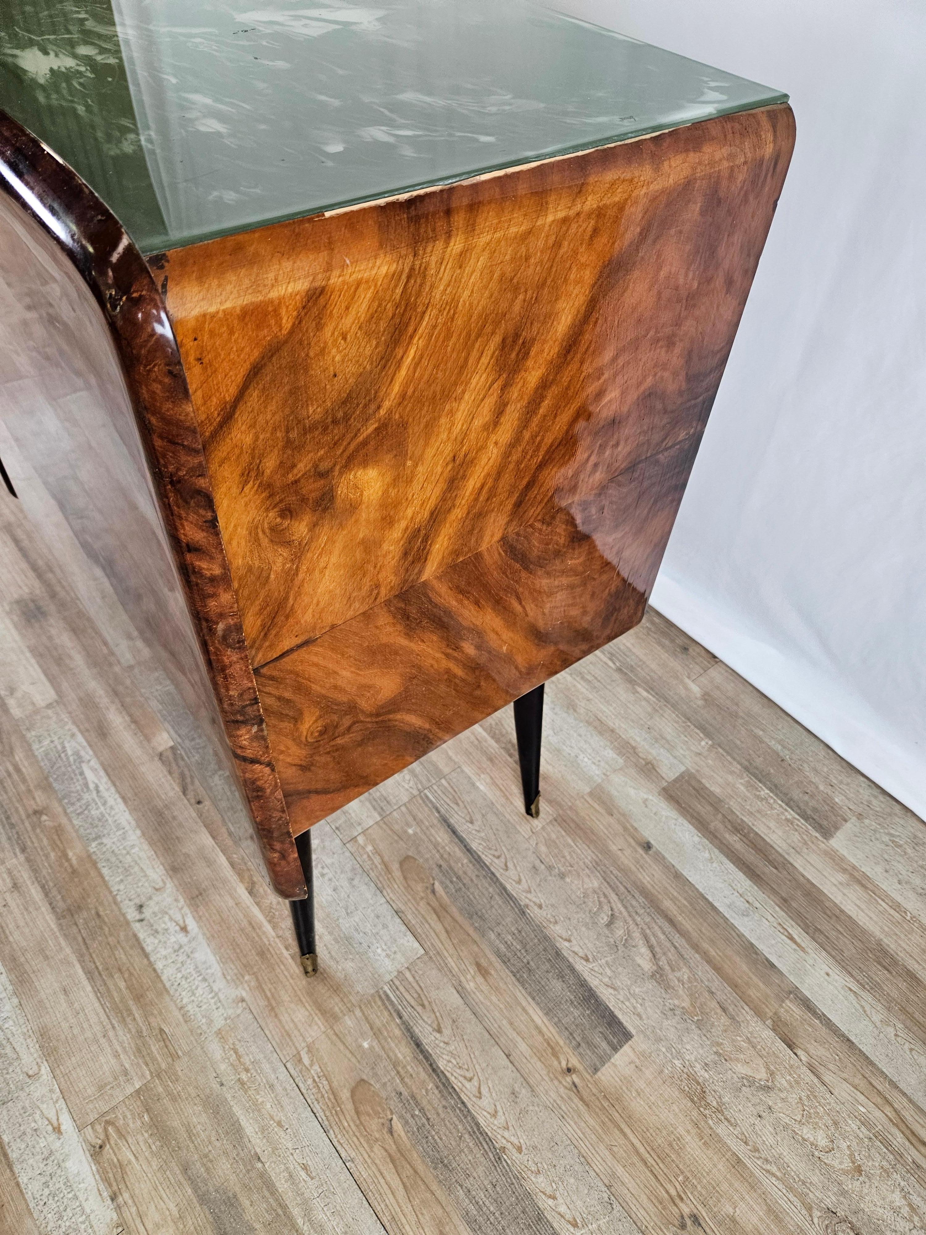 Mid-Century Modern Mid Century sideboard with drop down door and marbled glass top For Sale
