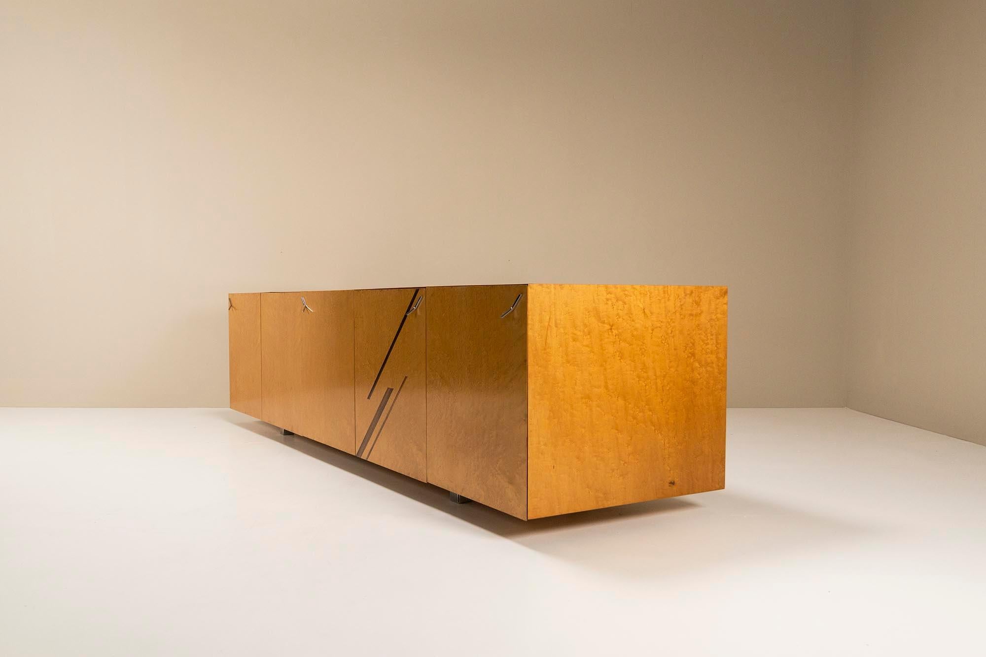 Saporiti's darling Giovanni Offredi showed with this 1970s sideboard from the 'Birds-Eye' series that he remained true to his modernist view on design. As a great critic of the rise of postmodernism back in the sixties and how it influenced Italian