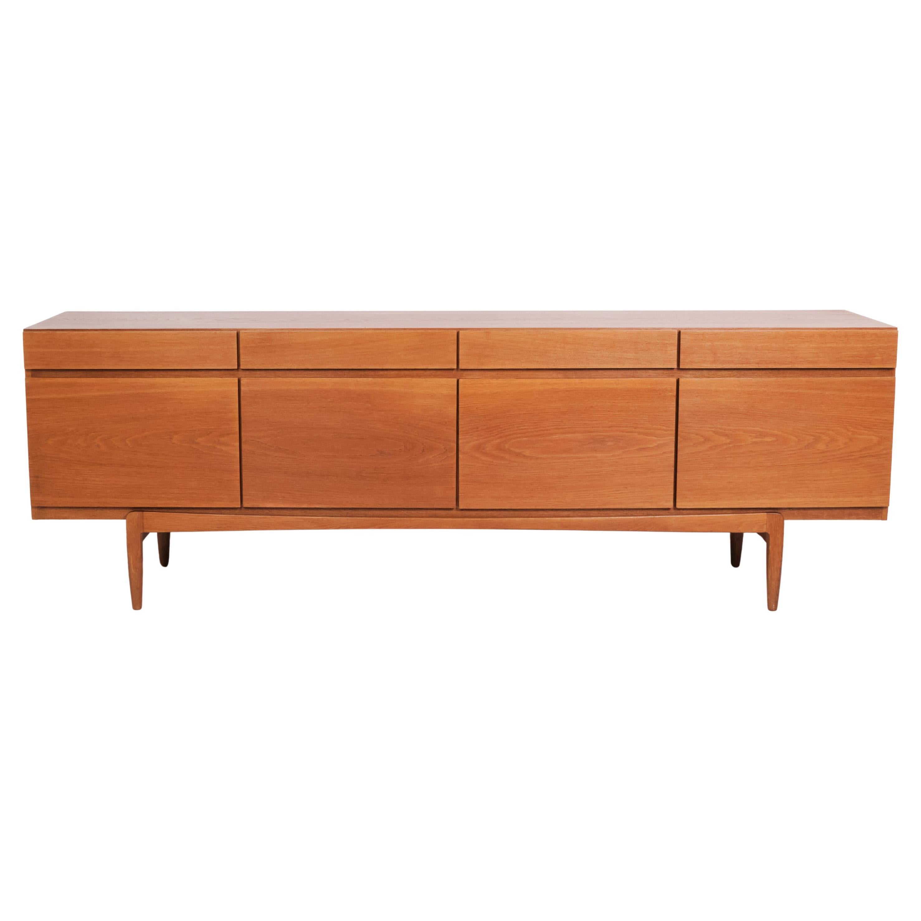 Sideboard Model FA66 In Oak By Ib Kofod-Larsen For Faarup Furniture Factory For Sale