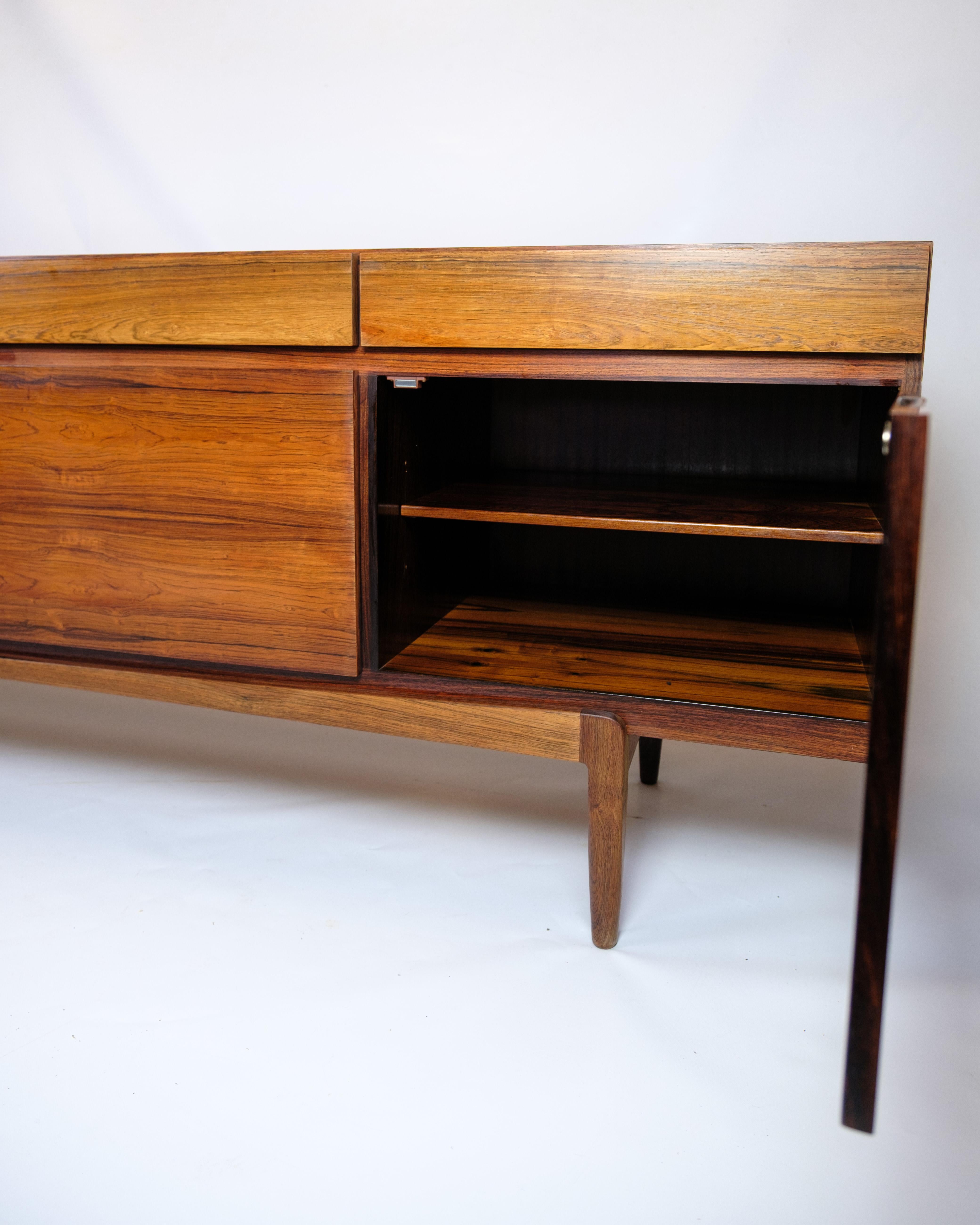 Mid-Century Modern Sideboard Model FA66 Made In Rosewood By Ib Kofod-Larsen For Faarup Furniture For Sale
