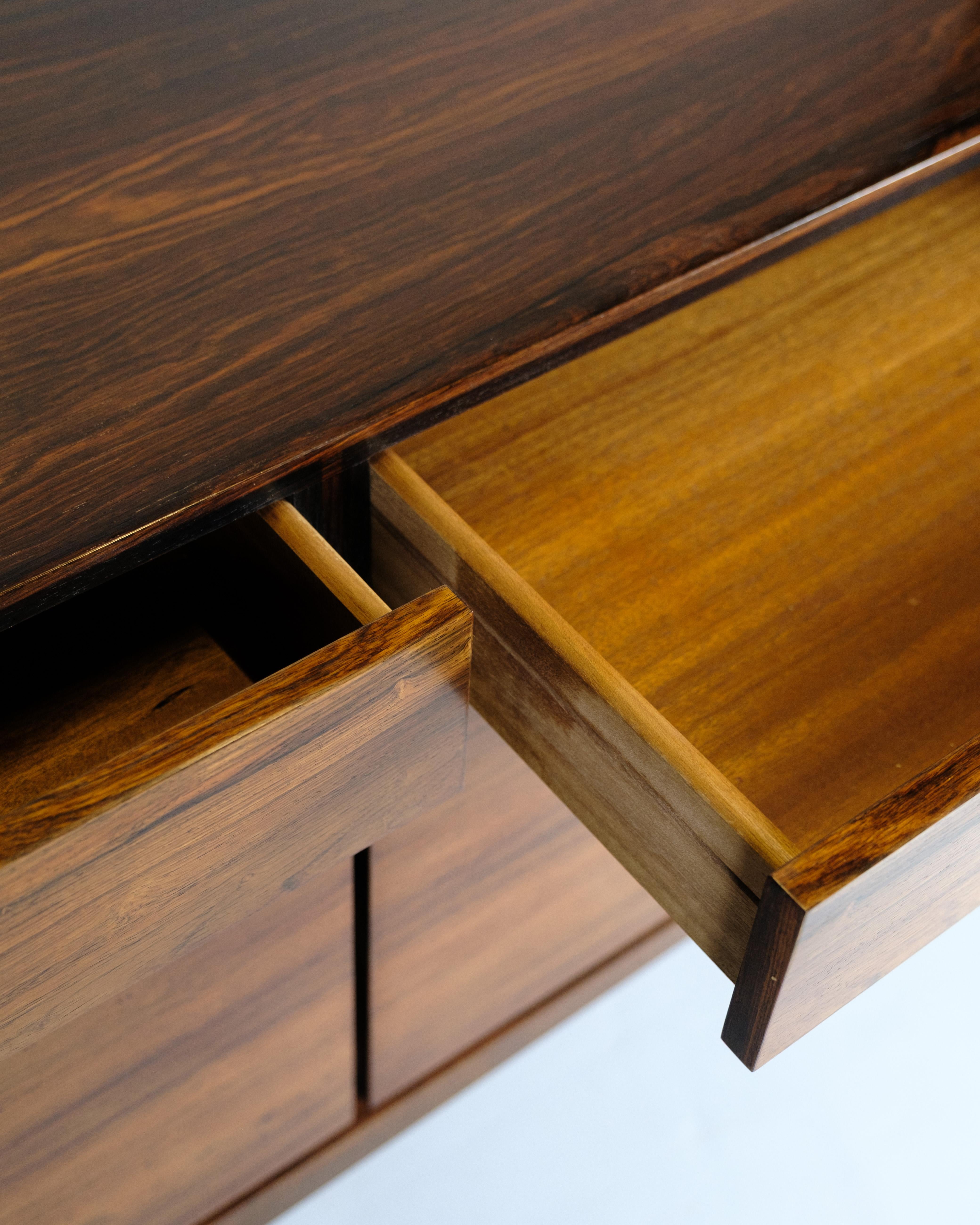 Mid-20th Century Sideboard Model FA66 Made In Rosewood By Ib Kofod-Larsen For Faarup Furniture For Sale
