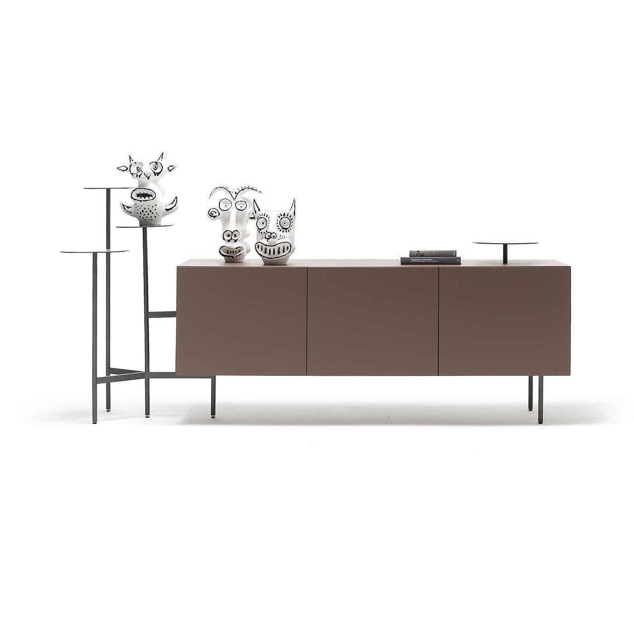 Brand: Mogg
Design: Uto Balmoral
Model: Ikebana Storage Cabinet

The Ikebana Storage Cabinet by Mogg, designed by Uto Balmoral, offers a unique and contemporary solution for displaying objects, sculptures, and plants. Available in both high and low