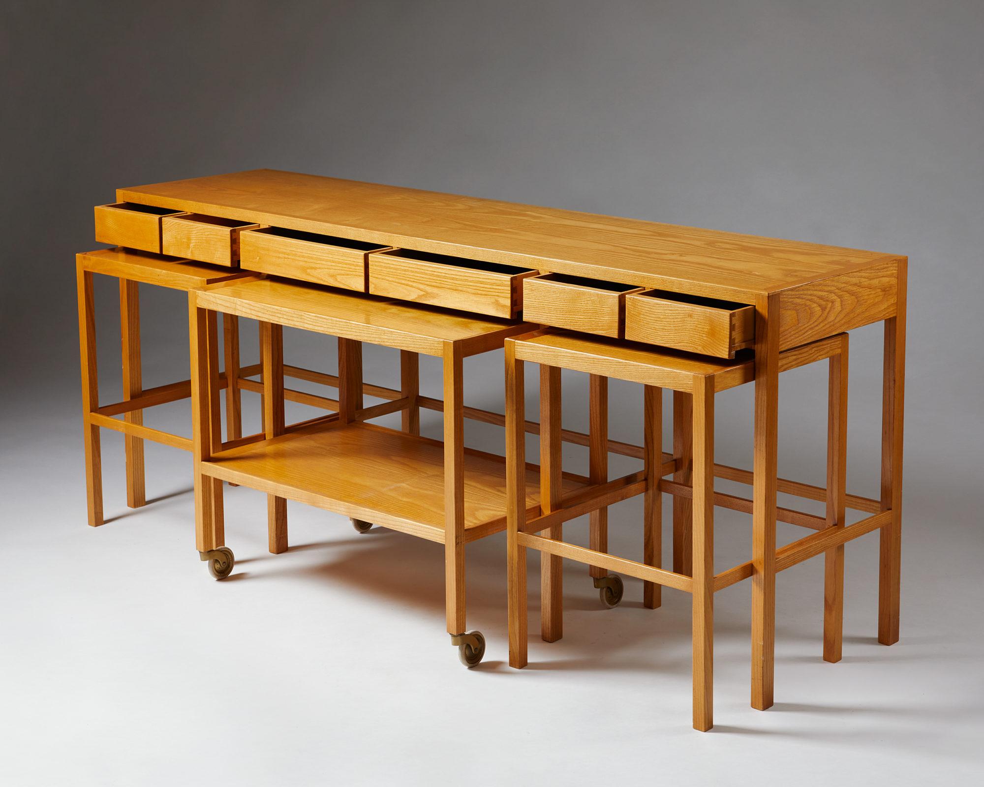 Sideboard/ nesting tables, anonymous, for Nordiska Kompaniet, Sweden, 1950s.
Elmwood.

Measures: H 75 cm / 2' 5 1/2