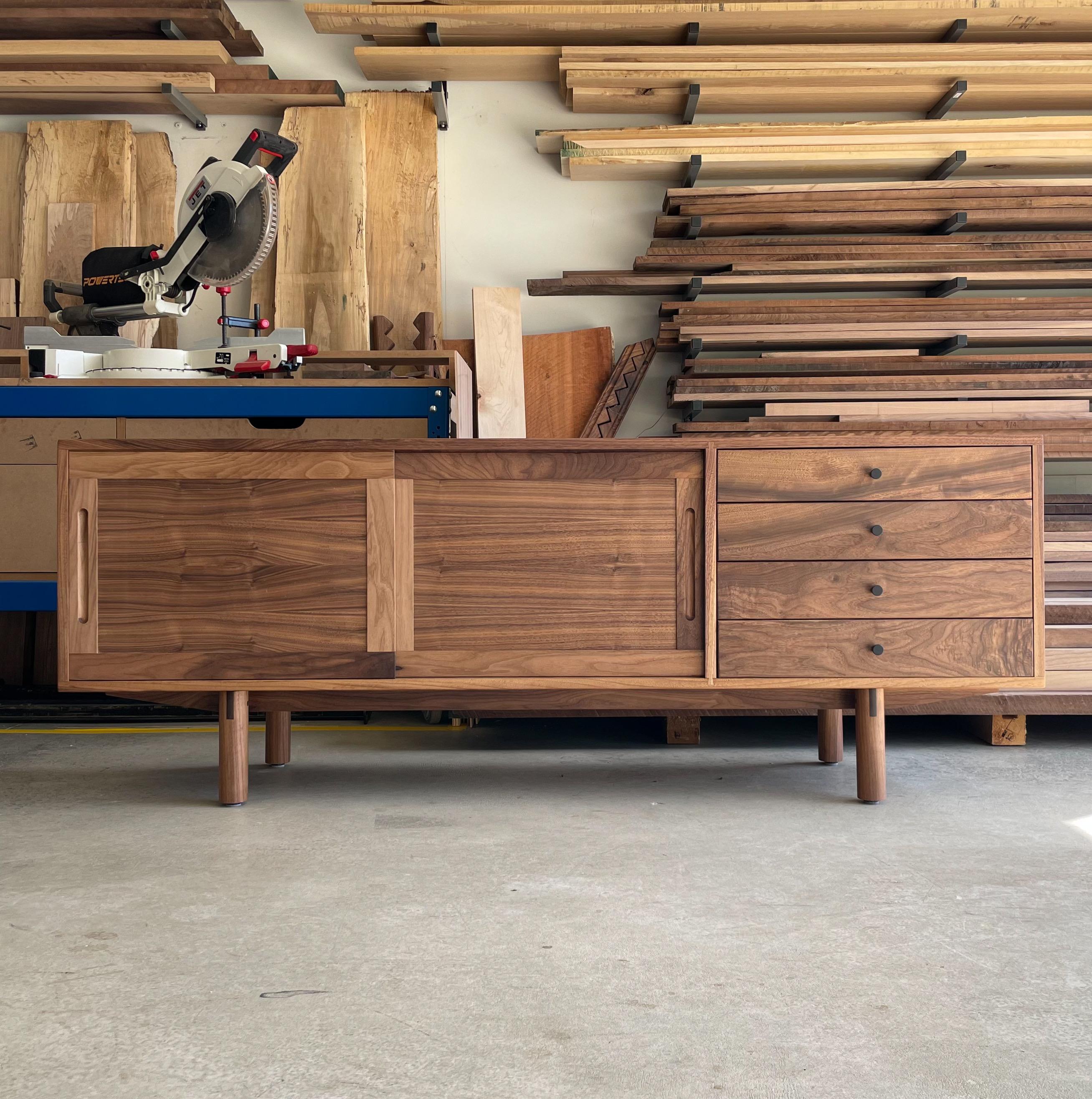 Sideboard No.5 is a highly detailed and functional cabinet featuring traditional joinery that has been lost in today's fast built, throw away furniture. Although there have been multiple made, no two are the same and are unique in their own way.