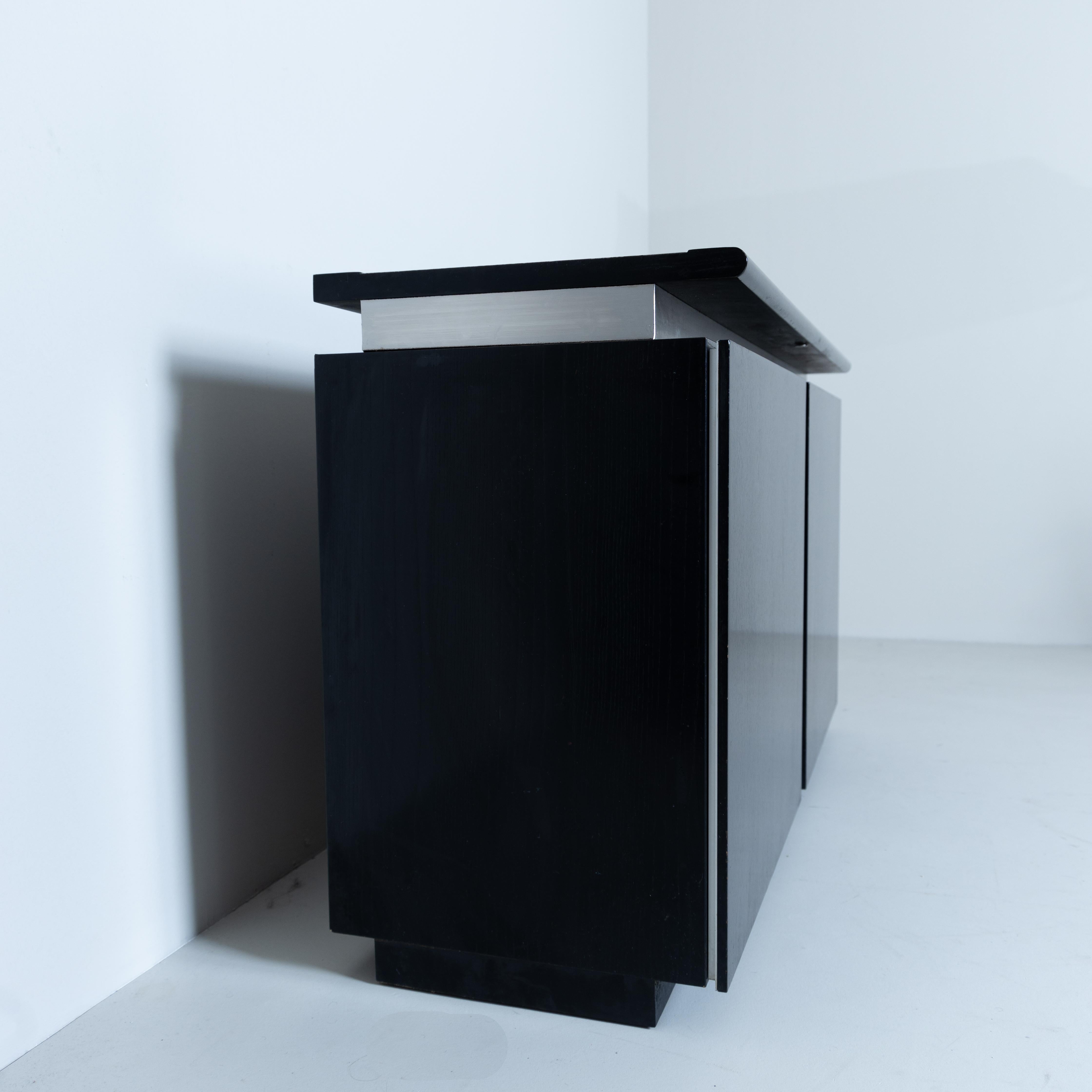 Storage cabinet, single piece, Lodovico Acerbis, Acerbis, Italy, 1980, wood veneer, lacquered metal, features an opening system with revolving doors, wear compatible with age and use, provenance: private home