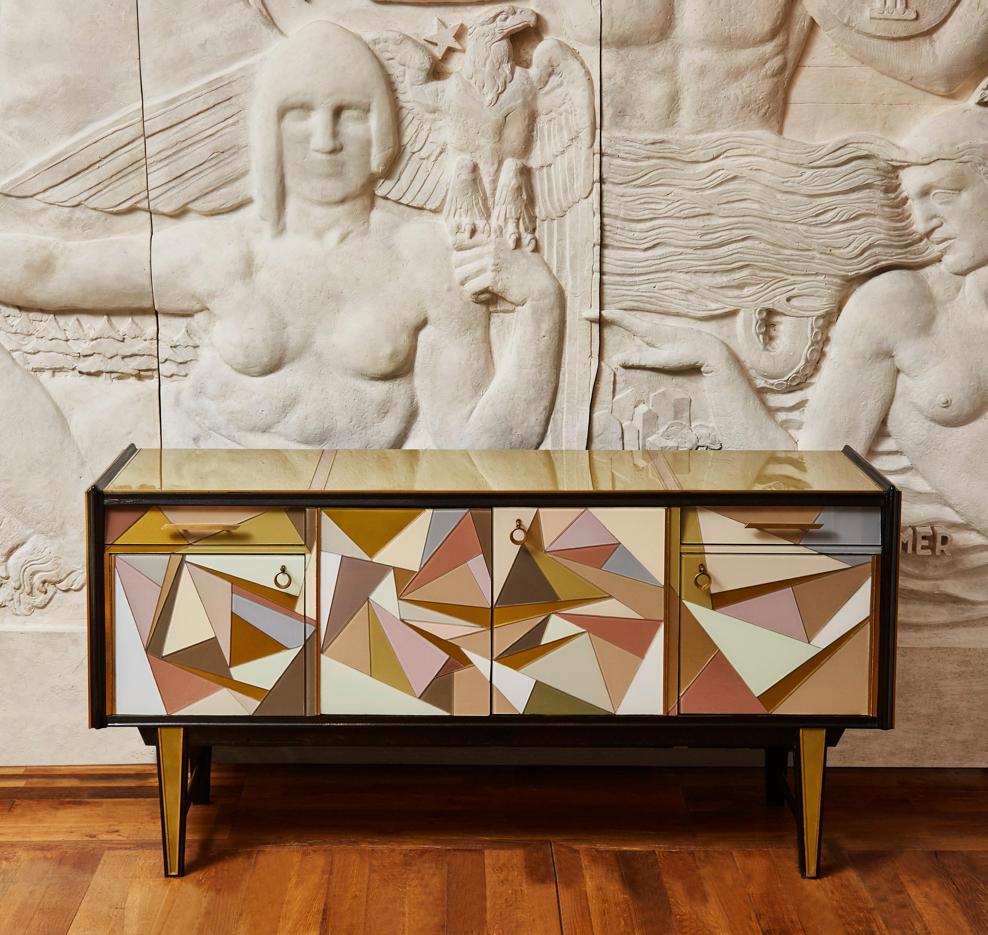 Vintage wooden sideboard, restored and customized with tainted mirrors and brass inlays. 4 doors and 2 doors. Measures: 4 feet. Creation Studio Glustin.