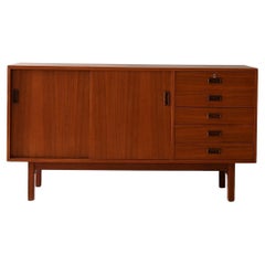 Scandinavian teak sideboard with sliding doors