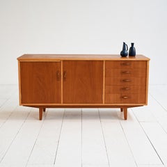 Scandinavian teak sideboard with 1960s pull-out top