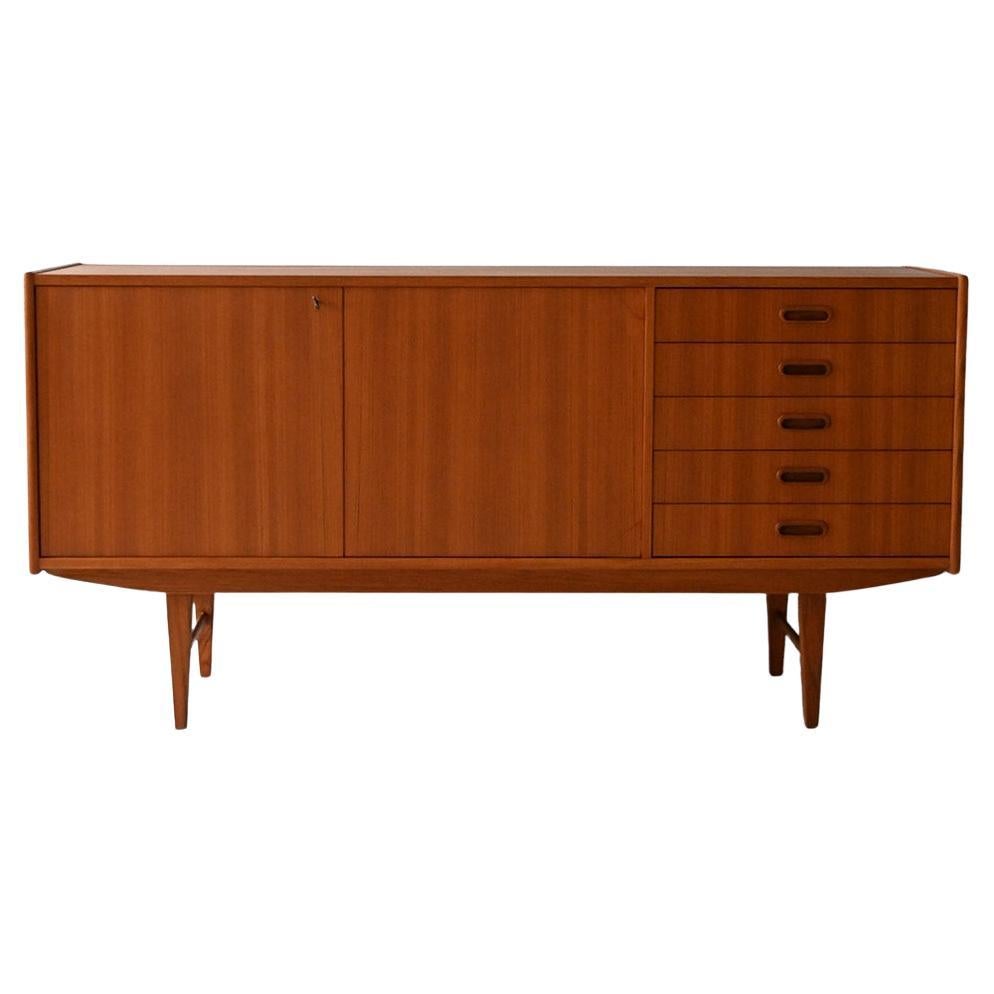 Sideboard scandinavo vintage in teak con cinque cassetti