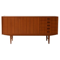 Sideboard scandinavo vintage in teak con cinque cassetti