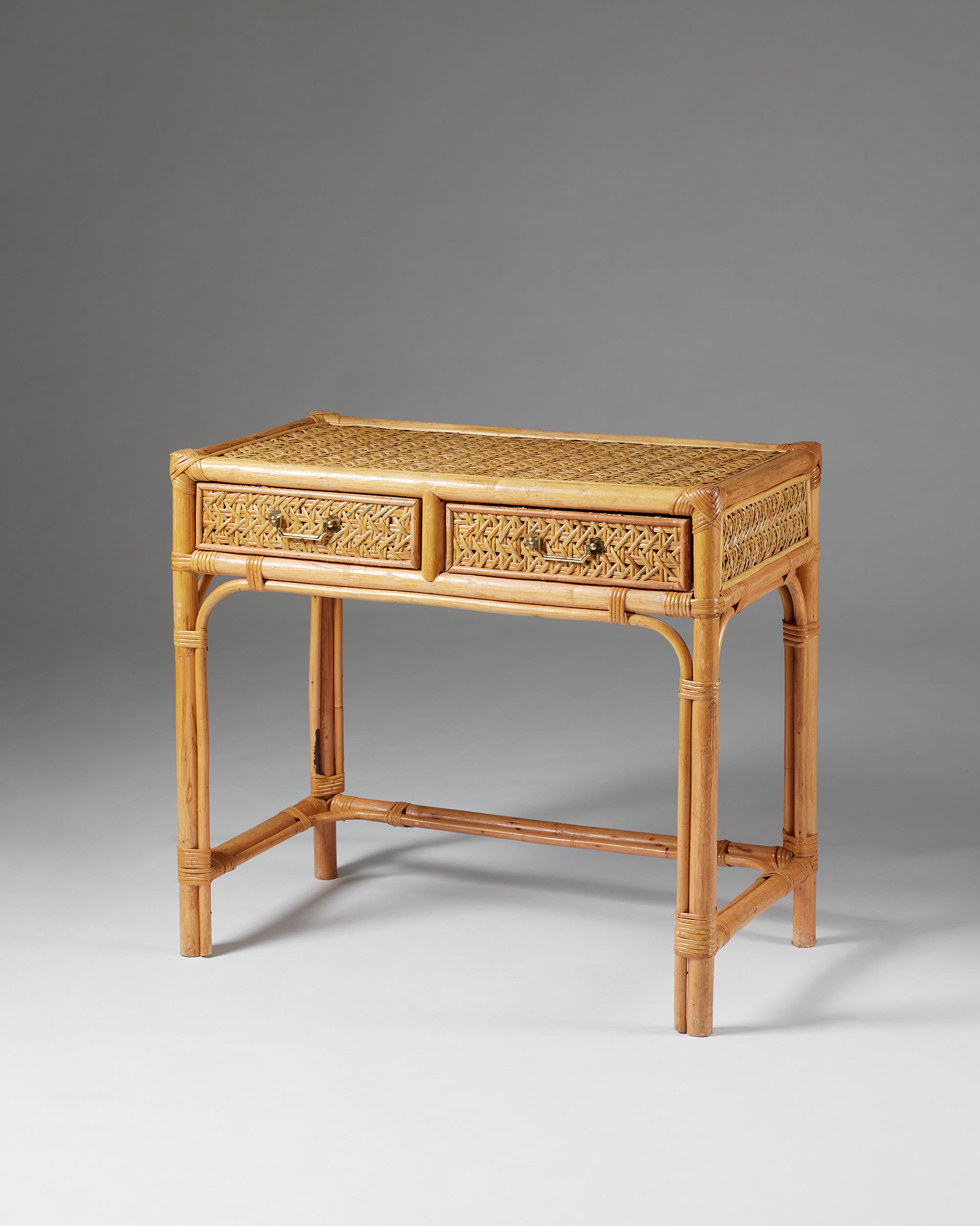 Sideboard / Side table, anonymous for DUX,
Sweden, 1960s.

Bamboo, rattan, and brass.

H: 74 cm / 2' 5''
L: 84 cm / 2' 9''
D: 47 cm / 18 1/2''
