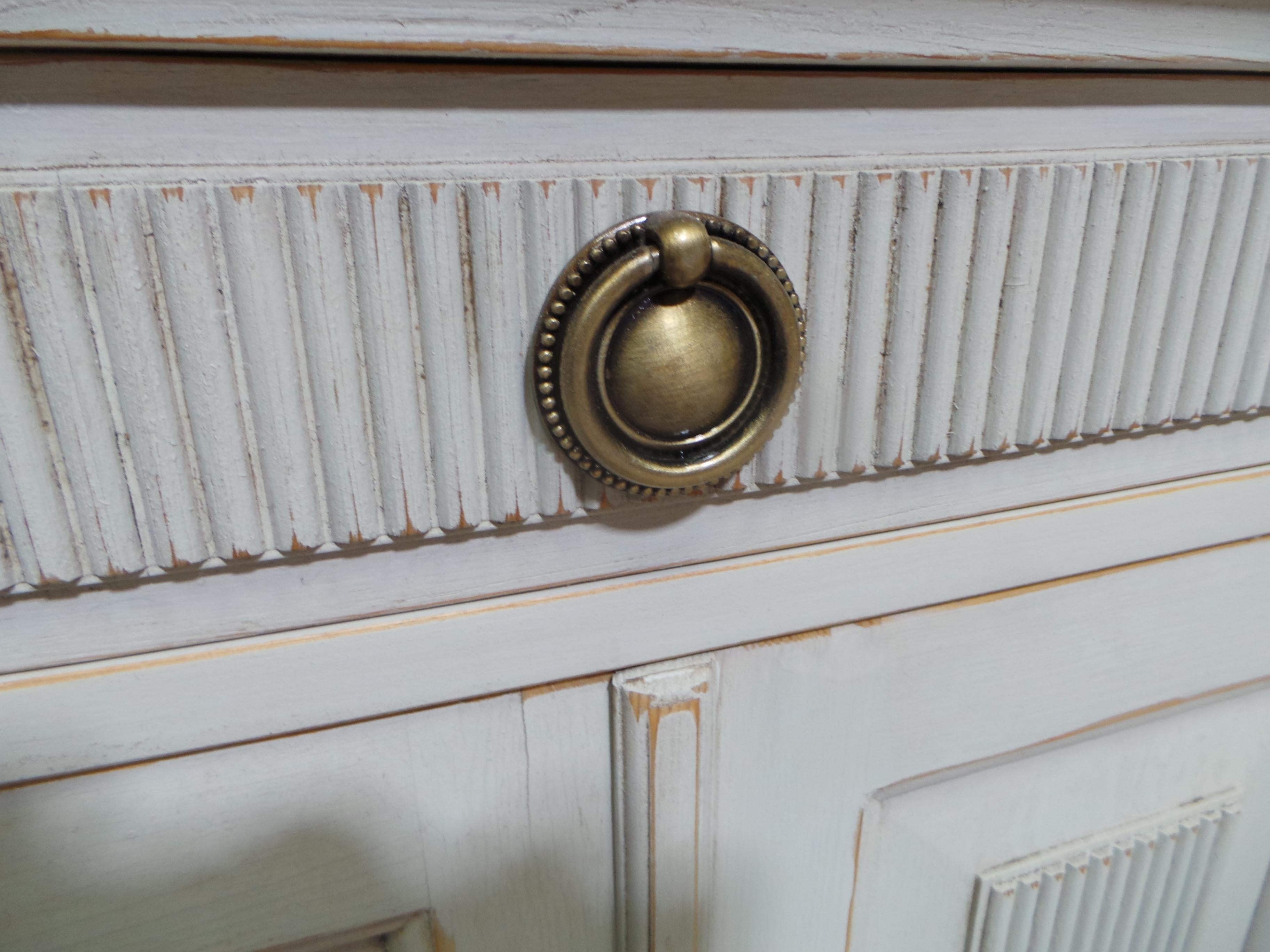 This is a Swedish Gustavian style Sideboard. its been restored and repainted with Milk Paints 