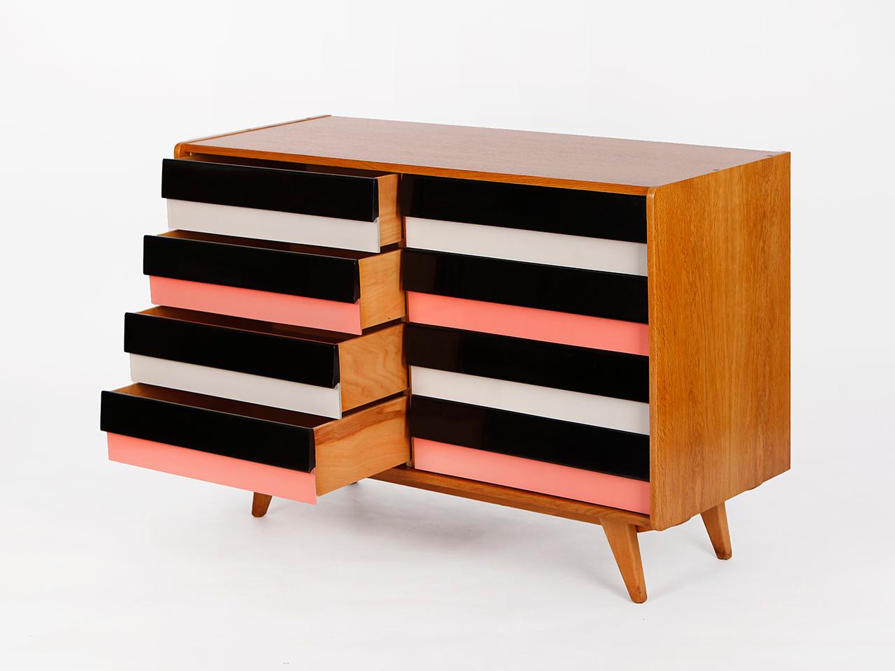 This model U-453 sideboard was designed by Jiri Jiroutek for Interior Praha in former Czechoslovakia. Produced in the 1960s.
Completely restored. Excellent condition. It is an early model with wooden drawers.