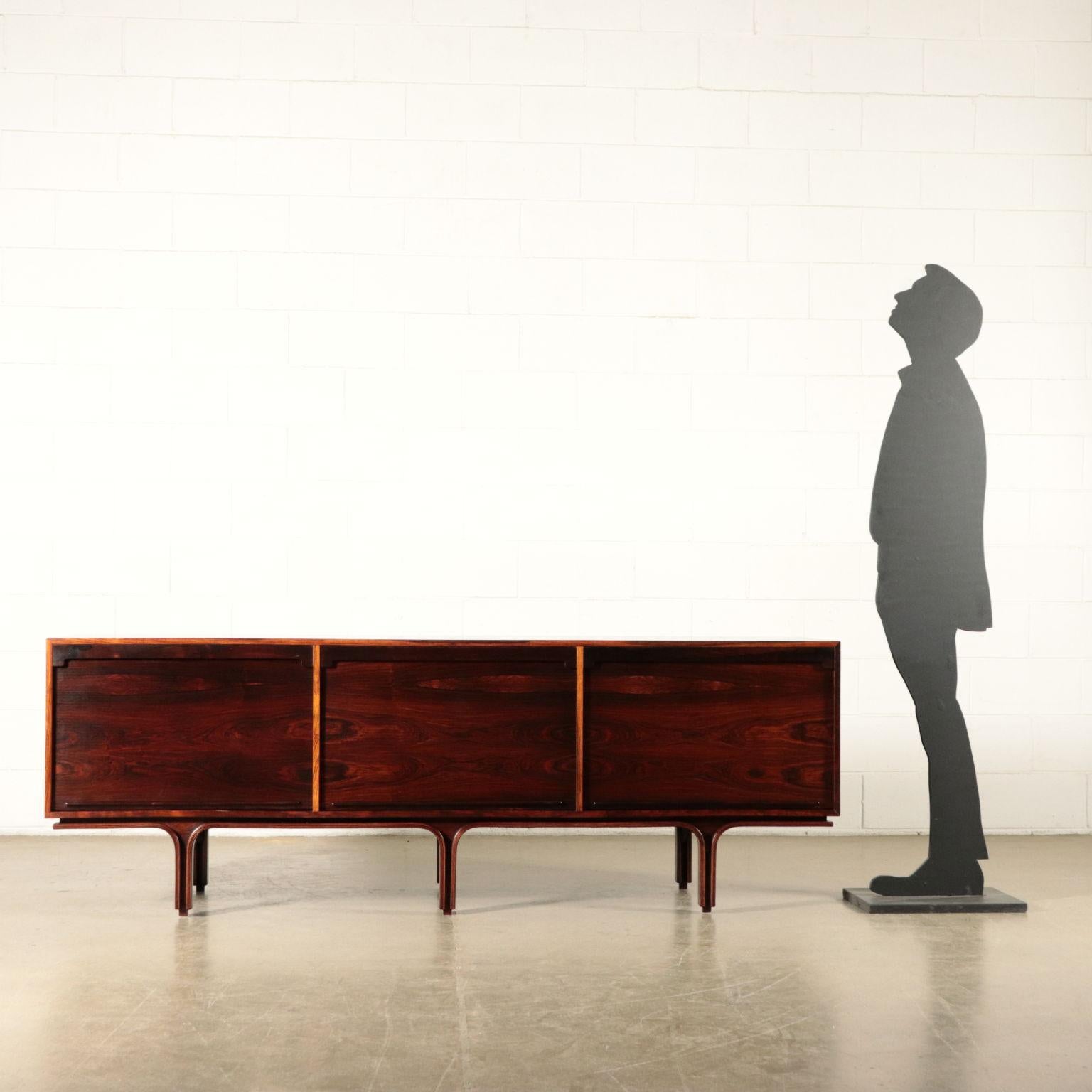 Sideboard with rolling shutter doors; veneered wood.