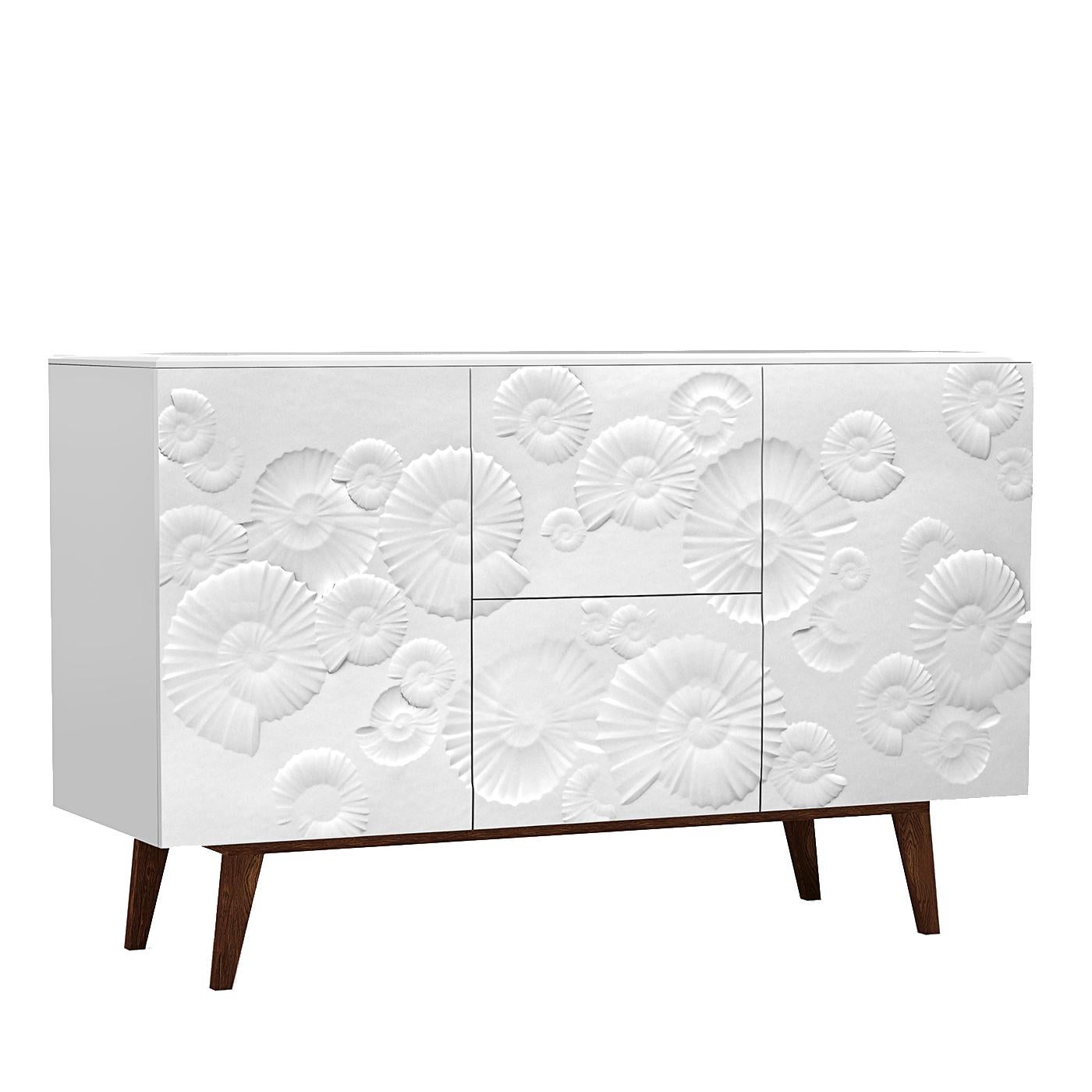 A stunning addition to both a Classic and a contemporary home, this sideboard will make a sophisticated statement in a living room or dining room, providing also precious storage space. The two lateral doors and two central drawers feature panels