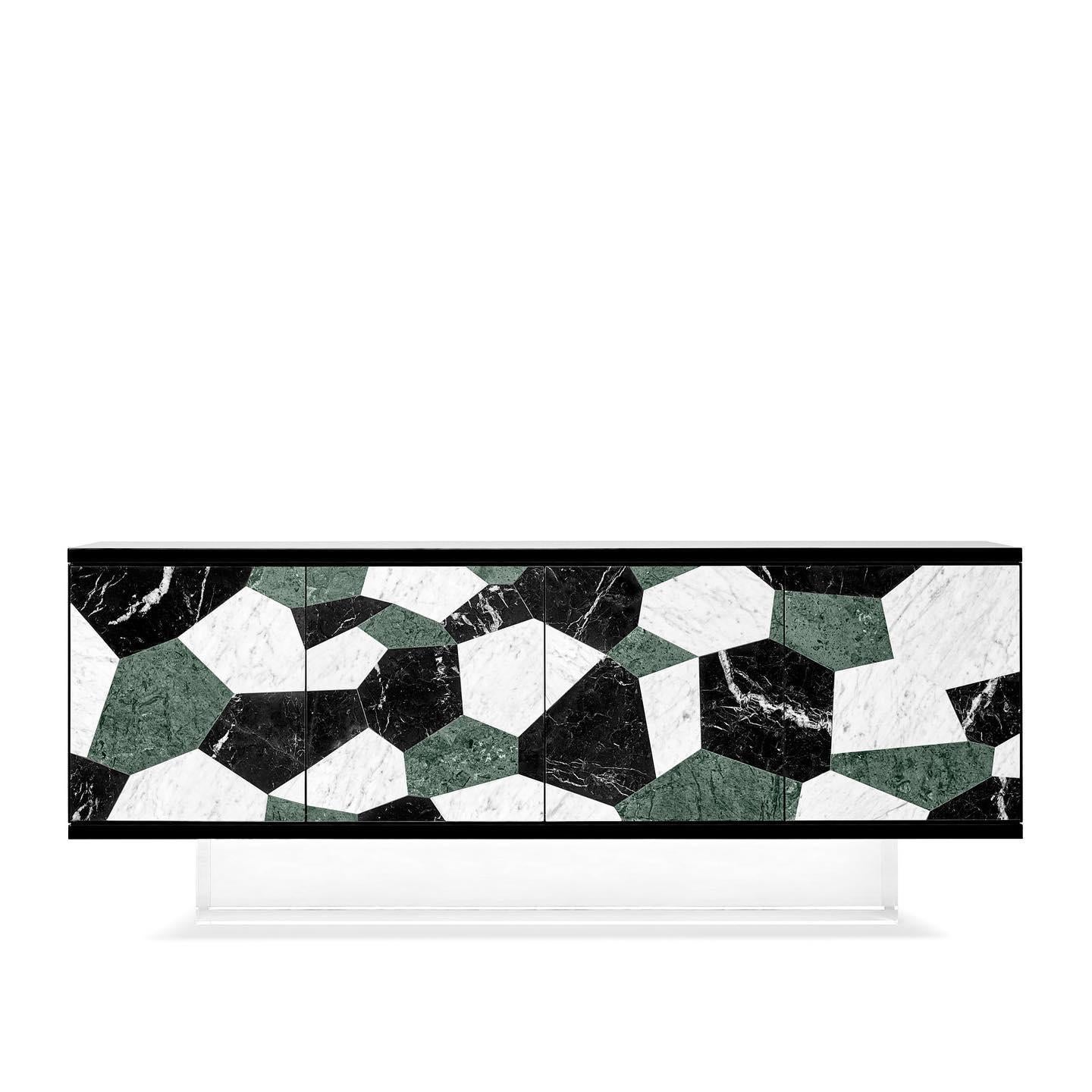 This sideboard has a singular kaleidoscopic marble pattern. The inlaying technique availed translates the visual pattern of a fractal, found in Nature, science and in human creation. The sideboard has four compartments, each with a sliding drawer