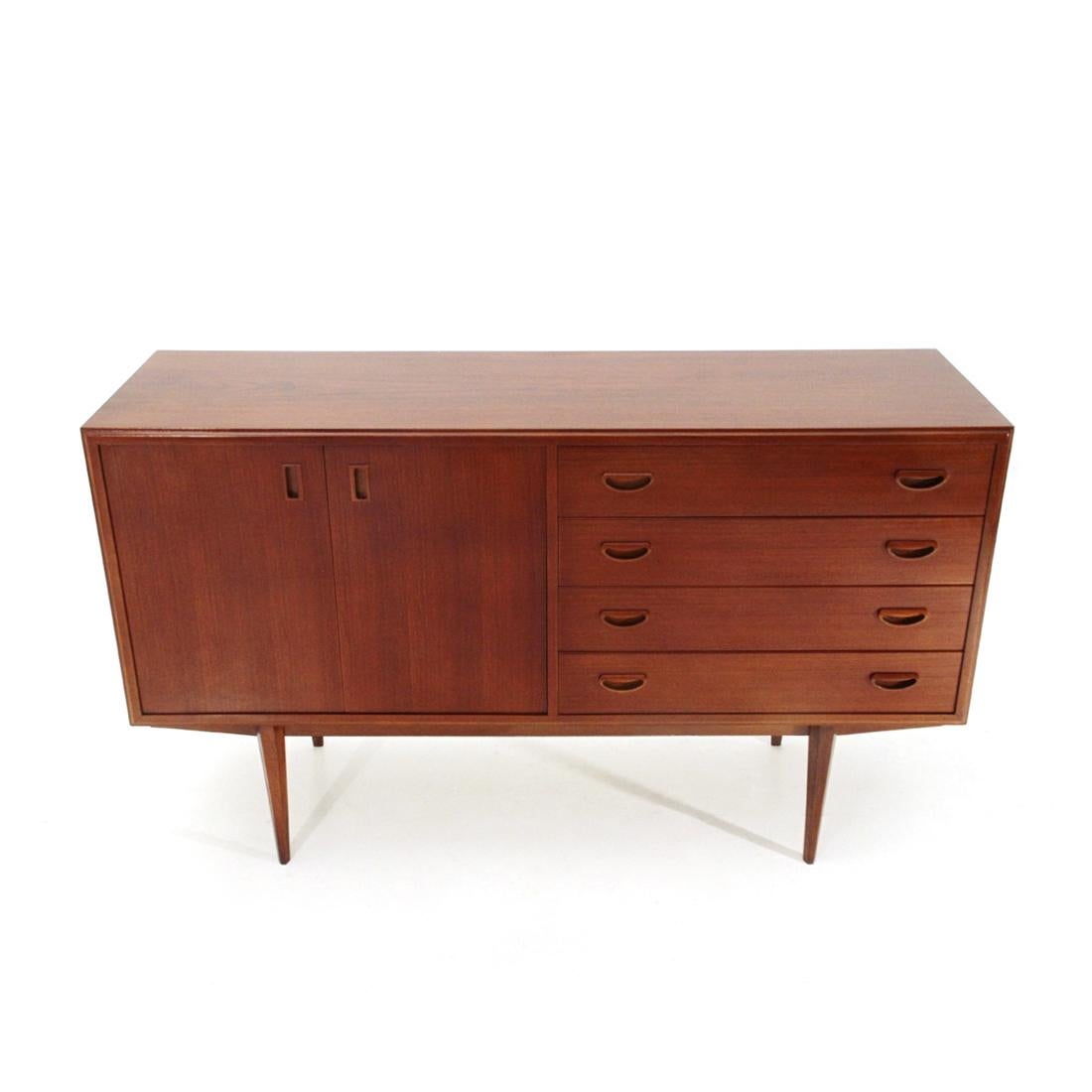 Sideboard of Italian manufacture produced in the 1960s.
Structure in veneered wood with slightly rounded profiles.
Storage compartment with internal shelf.
Four drawers.
Handles in shaped wood.
Support structure in solid wood.
Good general