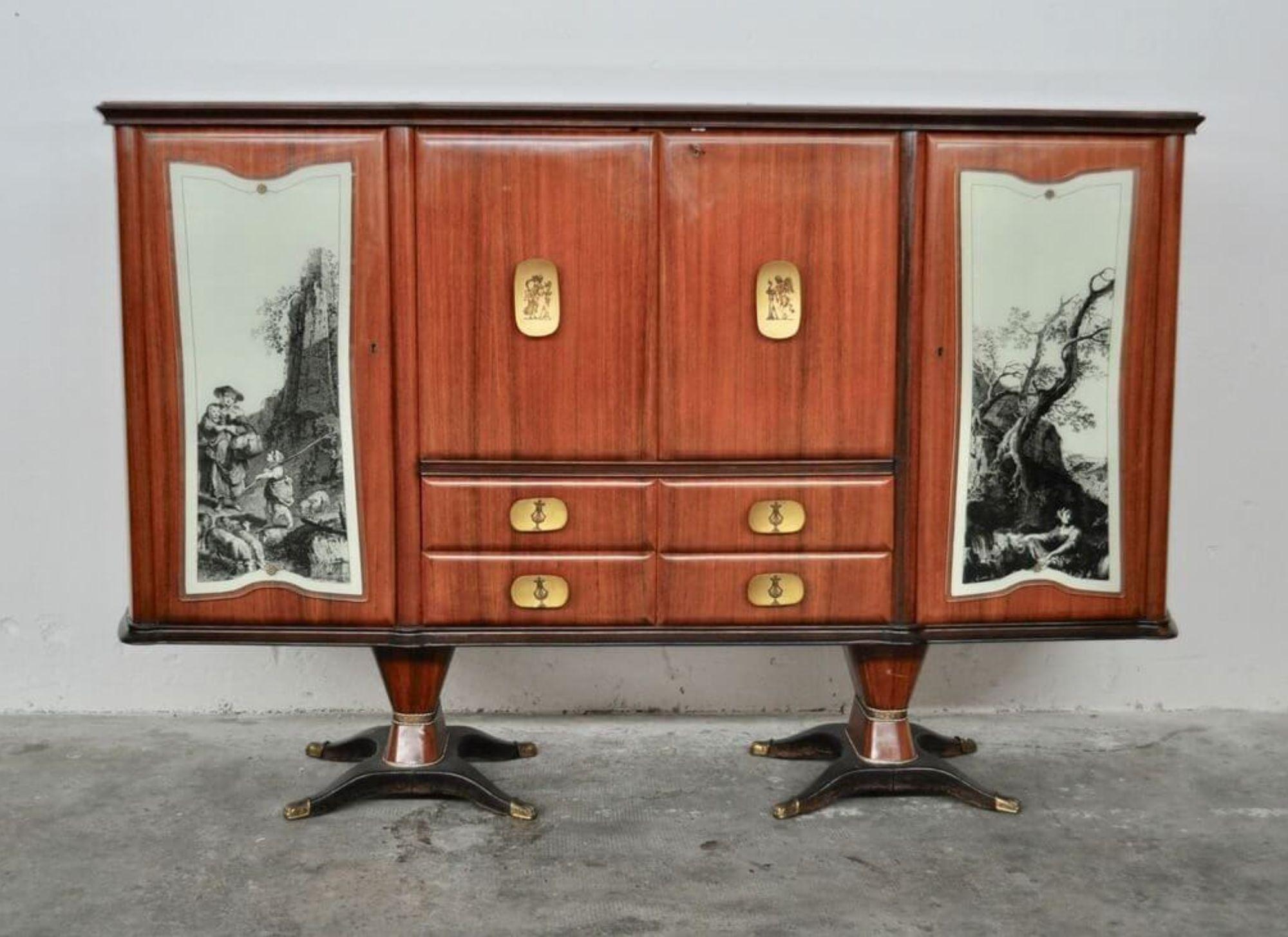 Elevate your home with this exquisite sideboard from the 1940s, a masterpiece of Italian design and craftsmanship.

Crafted from fine mahogany, pearwood, and marbled glass, this sideboard features allegorical drawings on the doors and illuminated