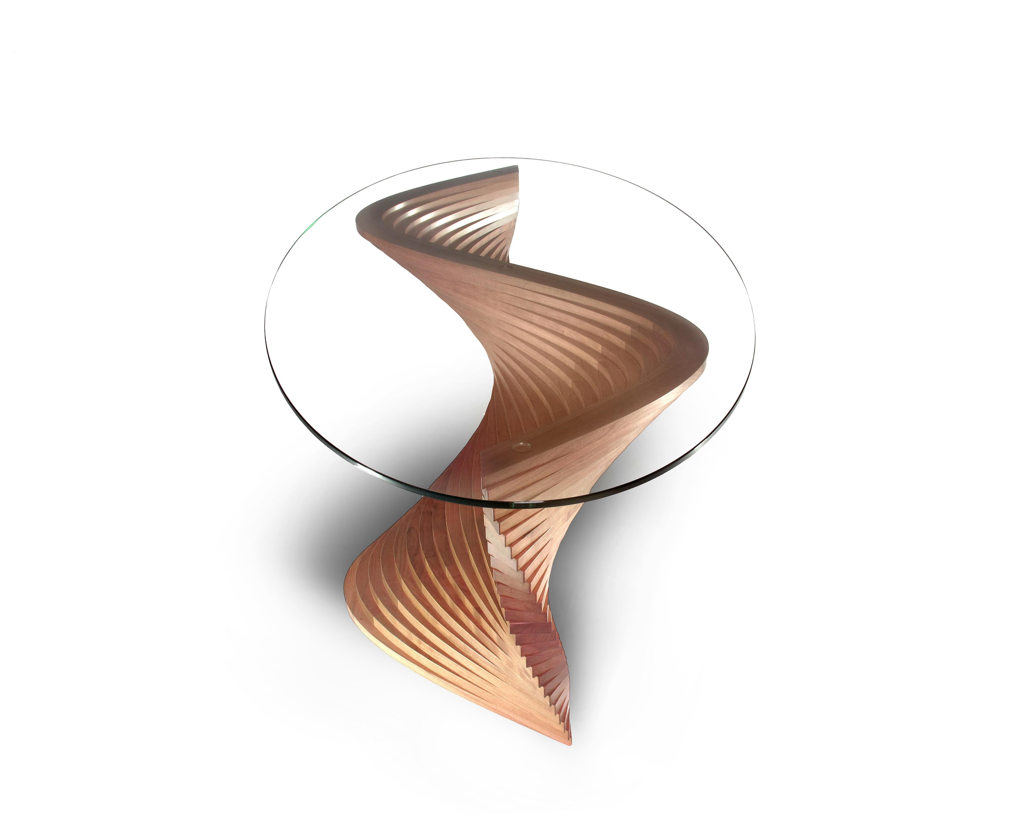 Sidewinder coffee table by David Tragen
Limited Edition of 10 
Dimensions: W 135 x D 75 x H 43.5 cm
Materials: American Walnut
Also available in American Cherry 

The concept behind Into the Abyss, was the disintegration of matter as it enters