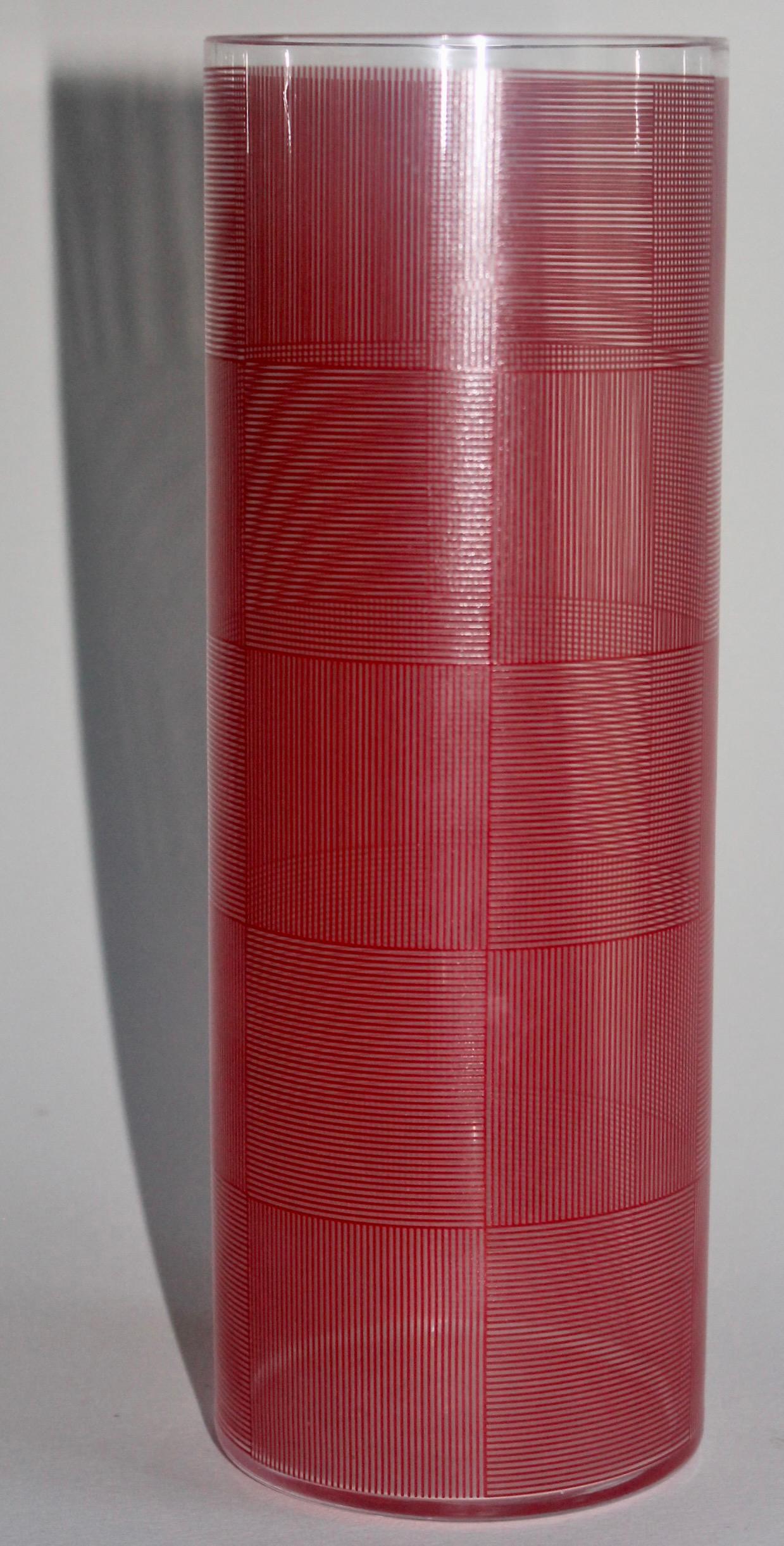 Designed by Sydney Cash, a printed (red) on very thin glass. optical vase published in 2000 by MOMA, The Museum of Modern Art NY.
Sidney Cash is an important contemporary artist working in glass, and is 
represented by The Heller Gallery NYC.