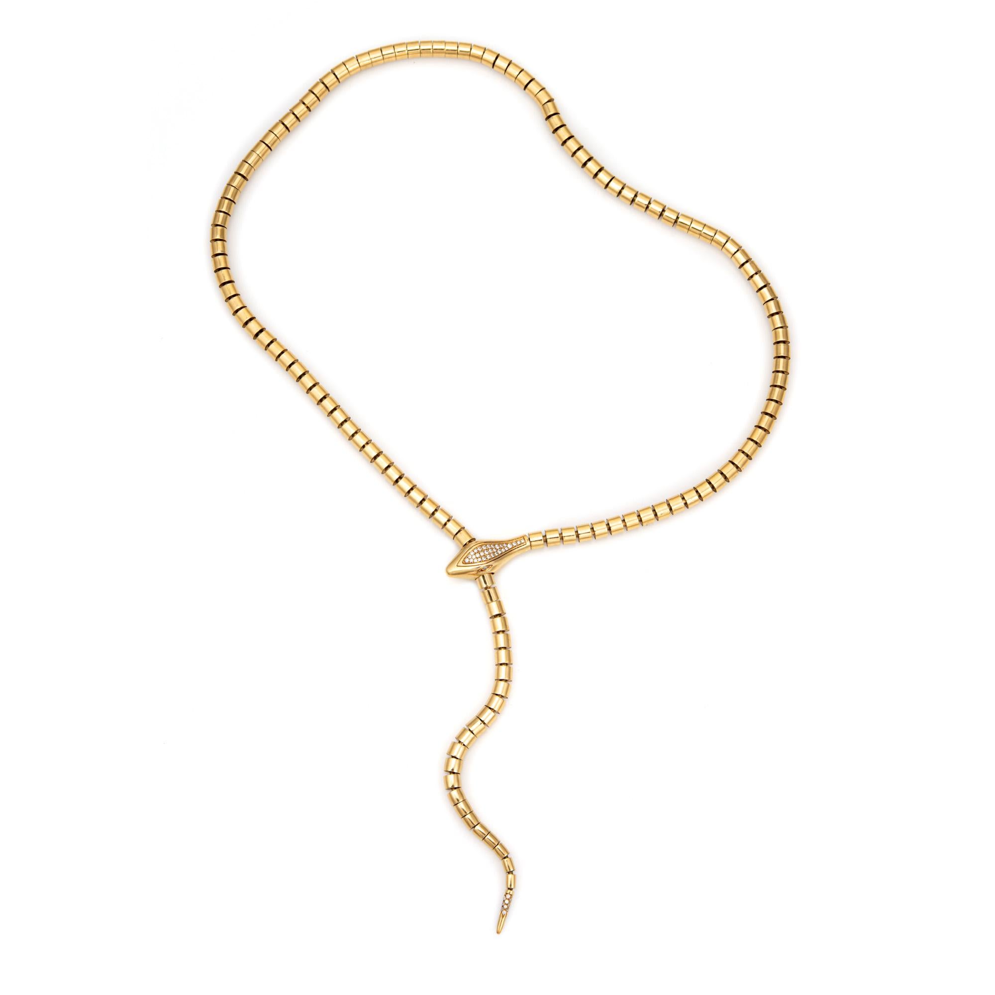 Stylish pre-owned Sidney Garber wrap around snake necklace, crafted in 18 karat yellow gold.  

Pave set diamonds total an estimated 0.34 carats (estimated at H-I color and VS2-SI1 clarity). 

The wrap around lariat necklace is a versatile piece