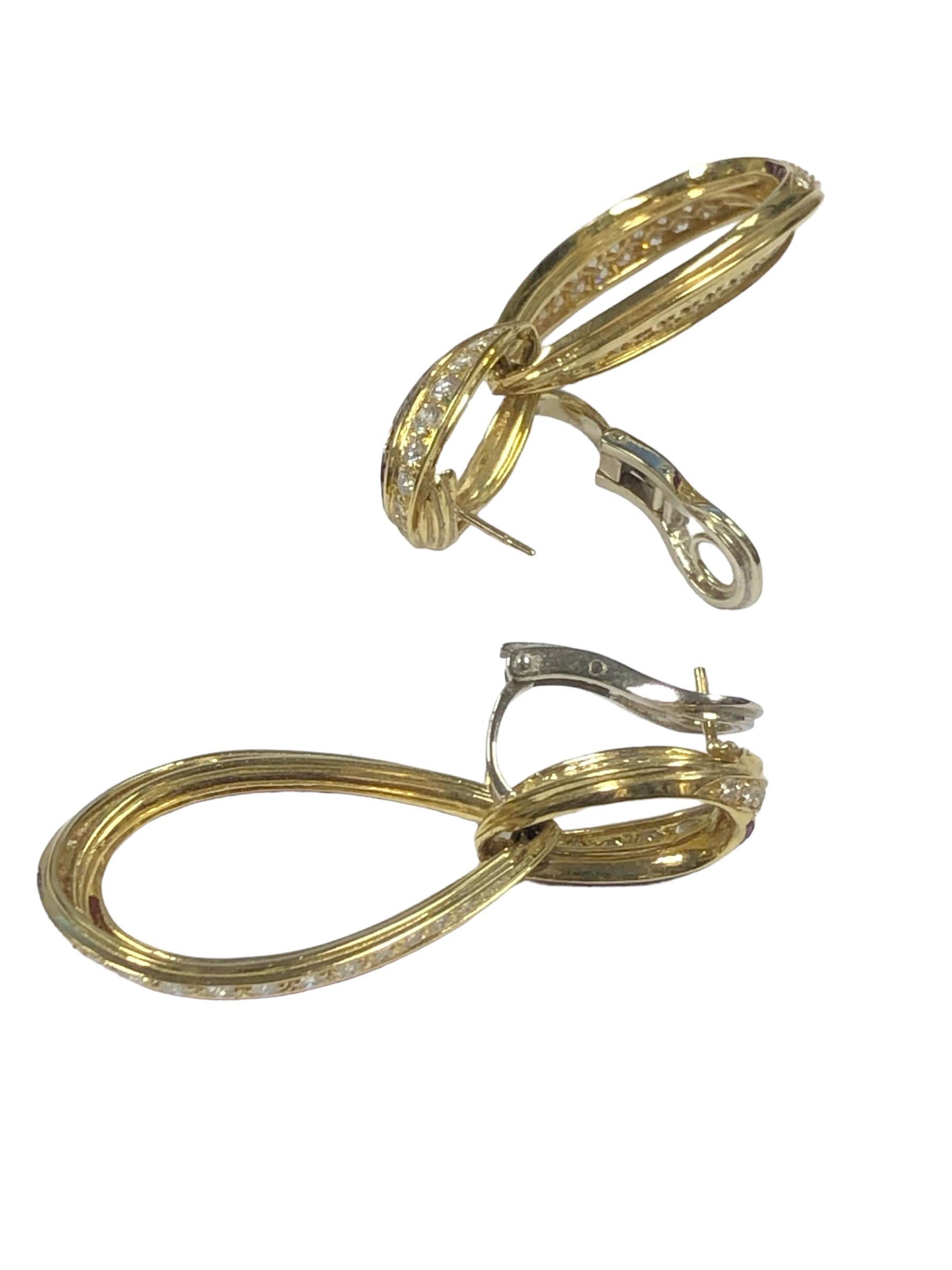 Circa 2000 Sidney Garber Inside out Hoop Dangle Earrings, These amazing Earrings measure 2 inches in length and 1 inch wide, the bottom sections are separately attached so that that dangle and move,  Pave set inside and out with Round Brilliant cut