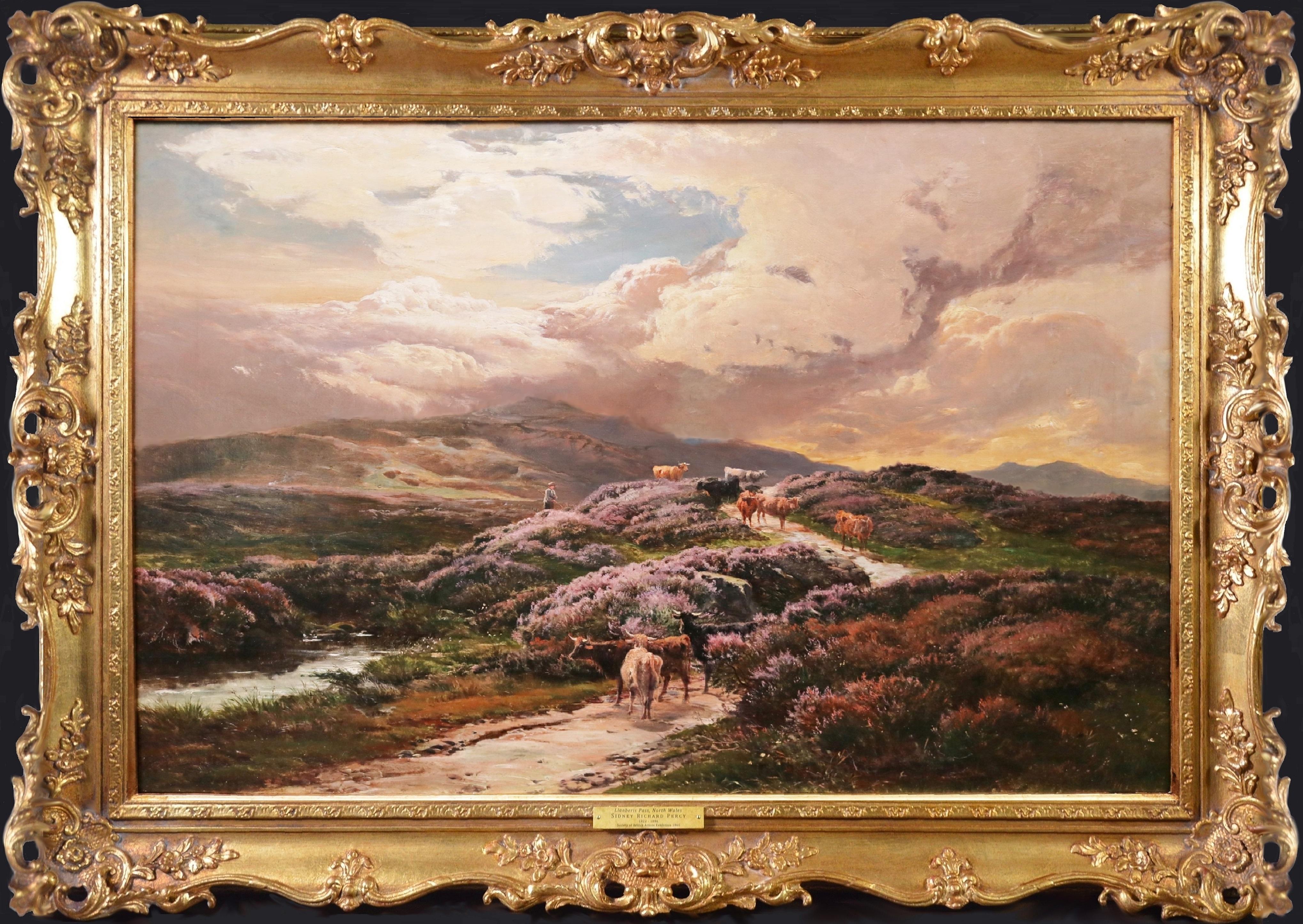 ‘Near Moel Siabod, North Wales’ by Sidney Richard Percy (1822-1886). The painting – which depicts a figure herding cattle before an extensive landscape in Snowdonia – is signed by the artist and presented in a fine quality, bespoke gold metal leaf
