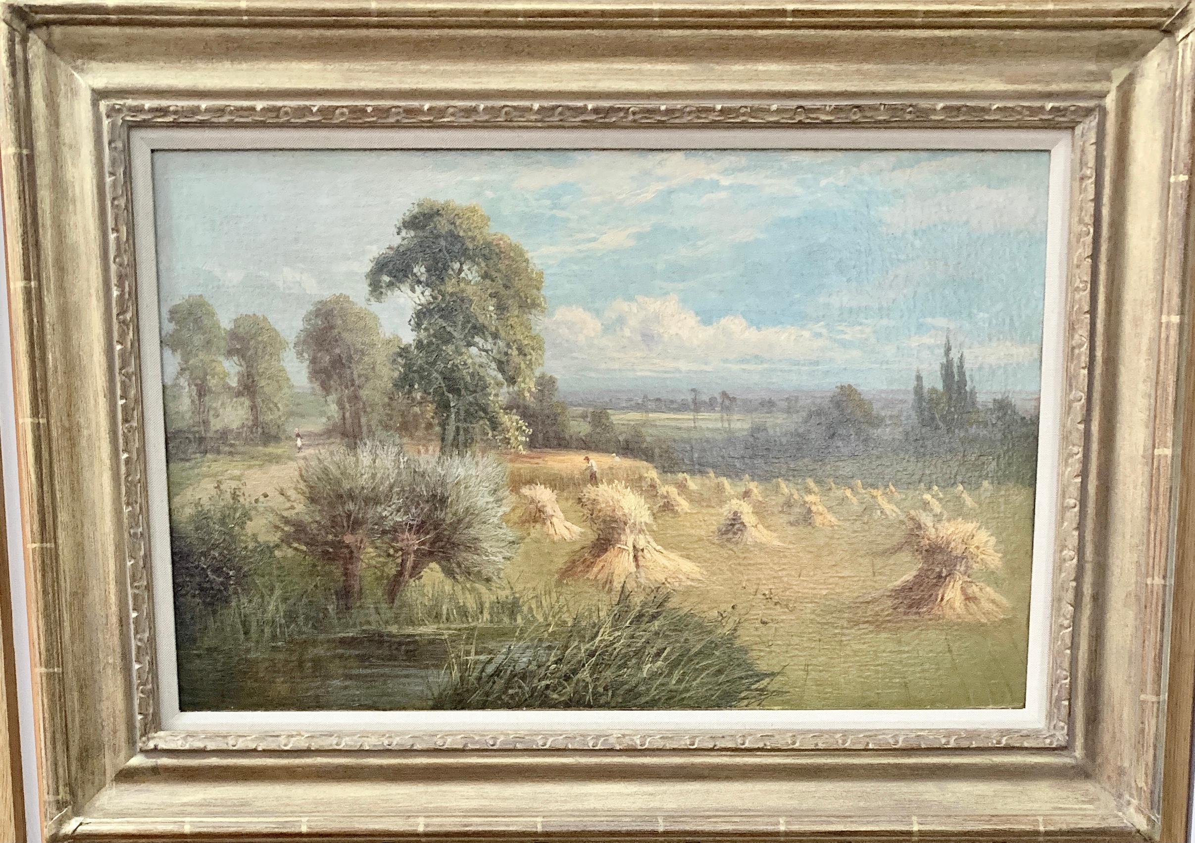 Paysage anglais du 19e siècle avec des fermiers récoltant le foin, un étang et un saule.