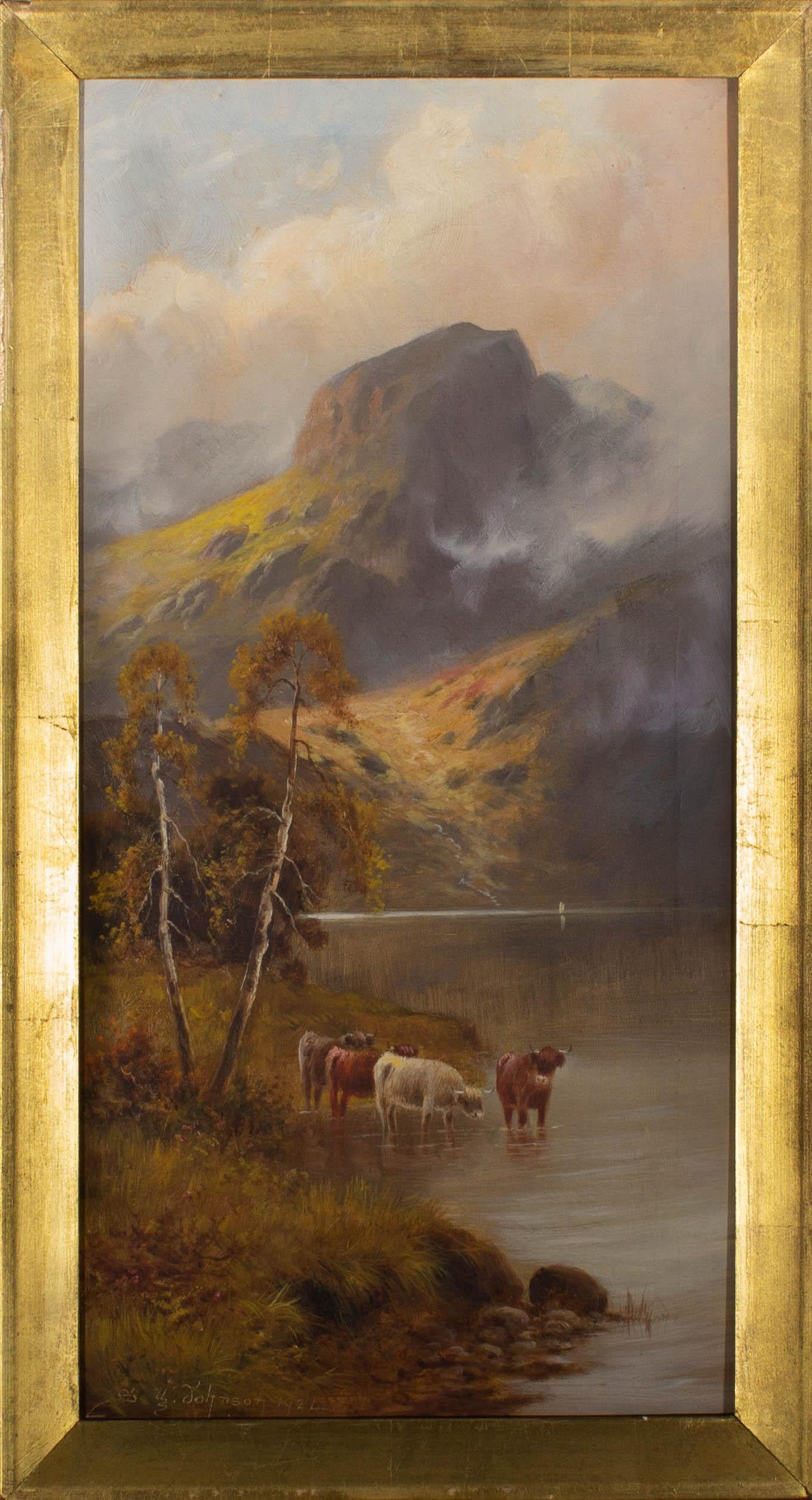 A Highland scene featuring cattle drinking from the edge of a loch. Mists swirl around the mountain peak in the background. Presented in a distressed gilt-effect slip. Signed and dated to the lower-left edge, On canvas on stretchers.
